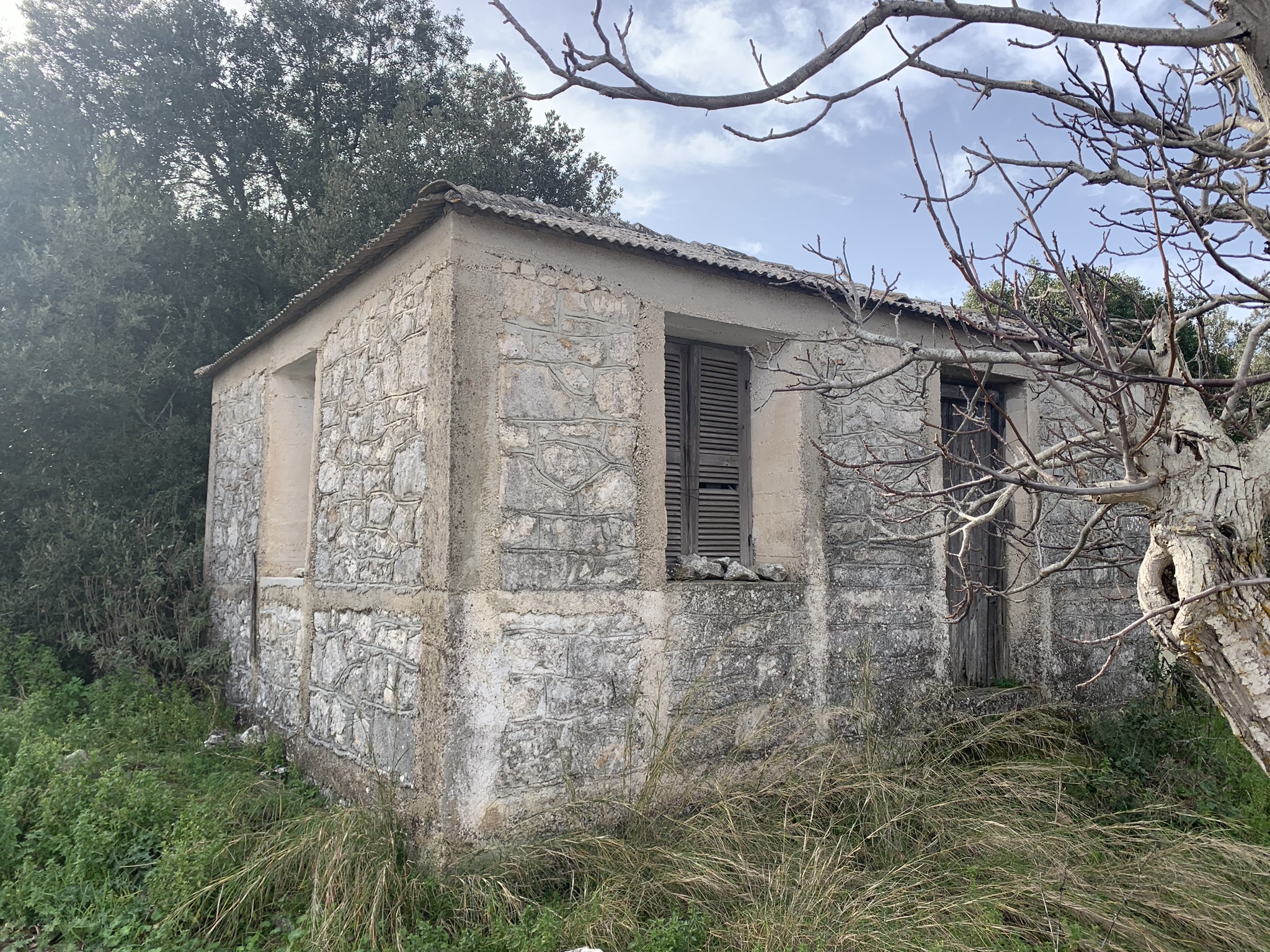 Exterioir of house with land for sale in Ithaca Greece, Anoghi