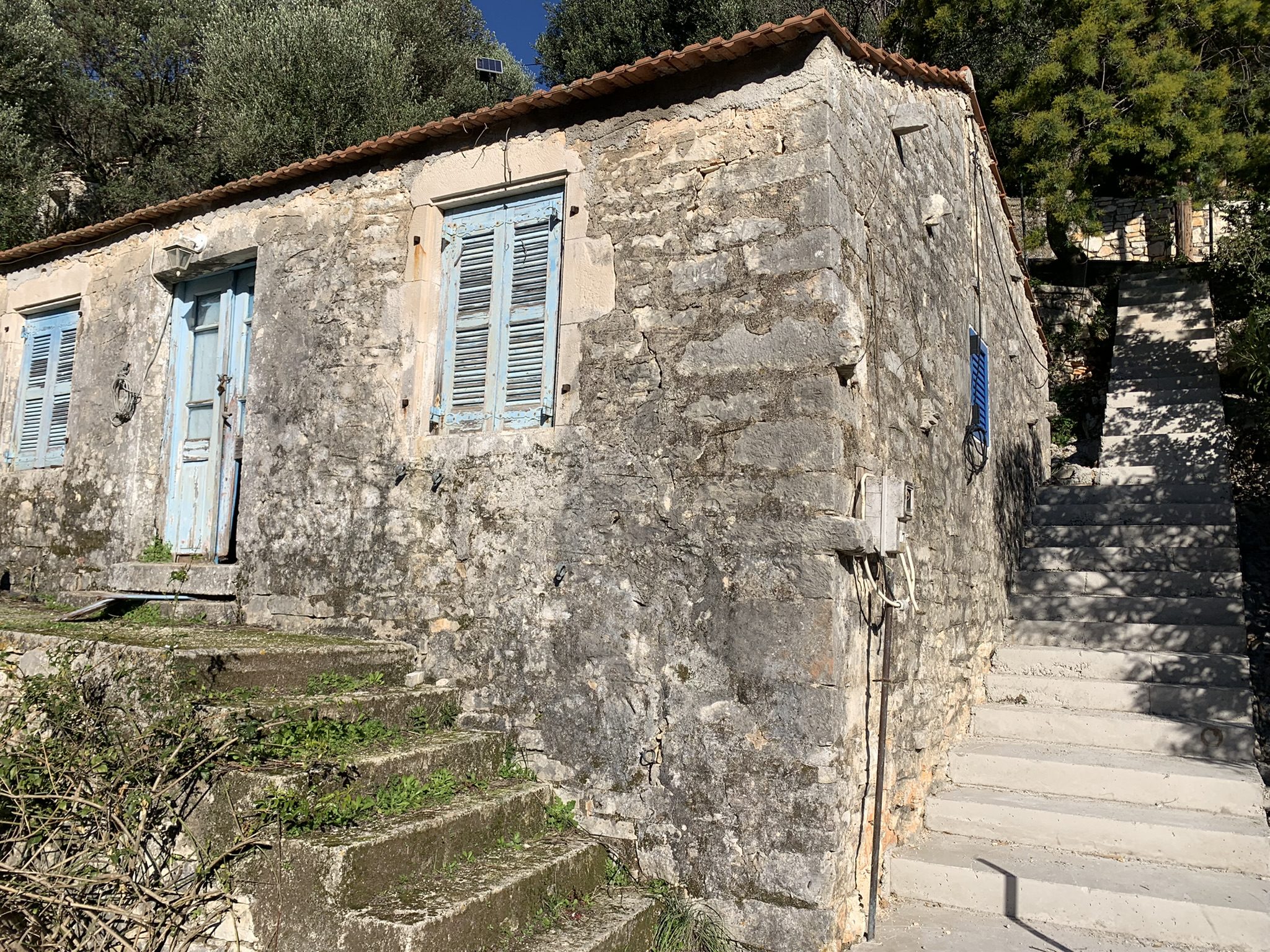 Exterior of house for sale in Ithaca Greece, Kioni