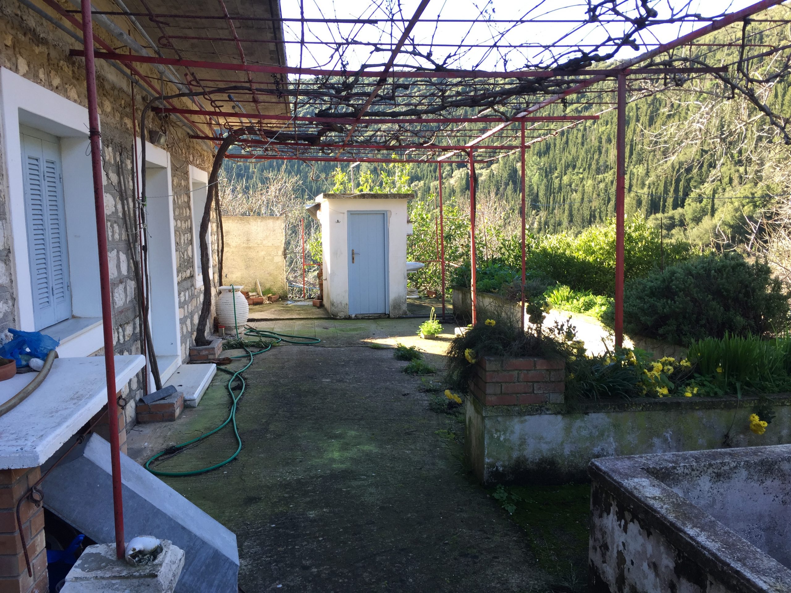 Back patio of house for sale in Ithaca Greece, Exoghi