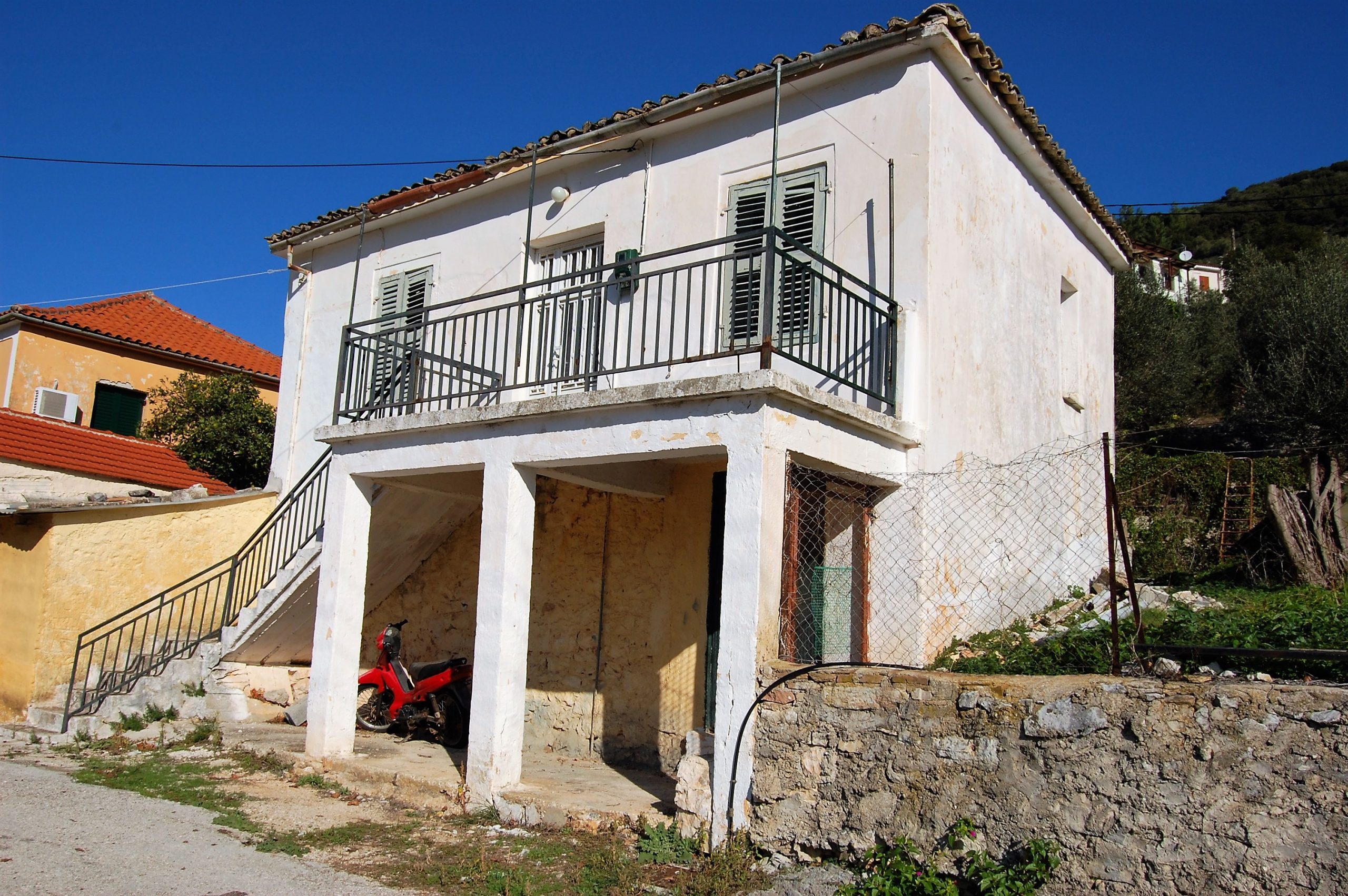 Exterior view of house for sale on Ithaca Greece