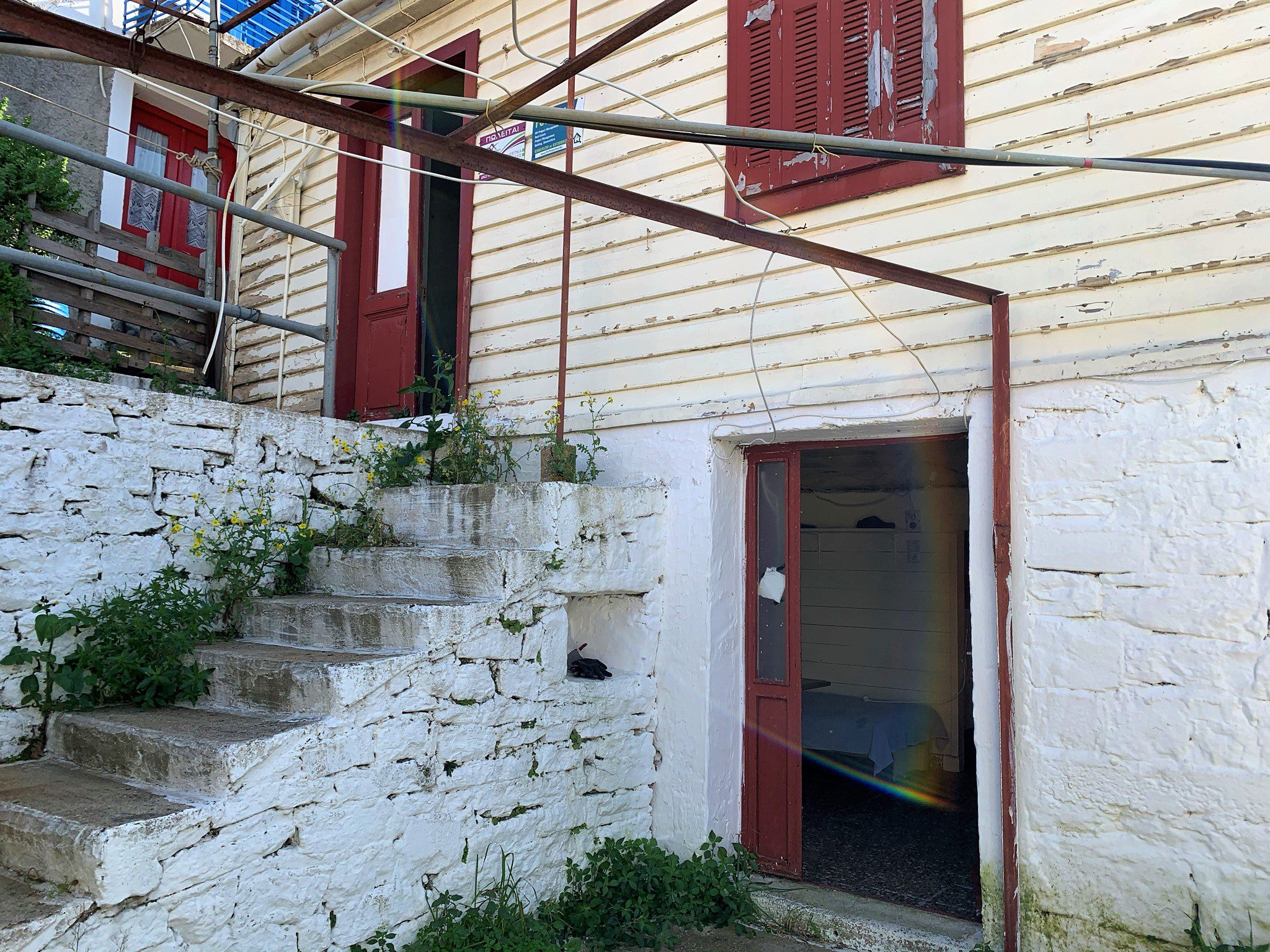 Exterior facade of house for sale in Ithaca Greece, kioni