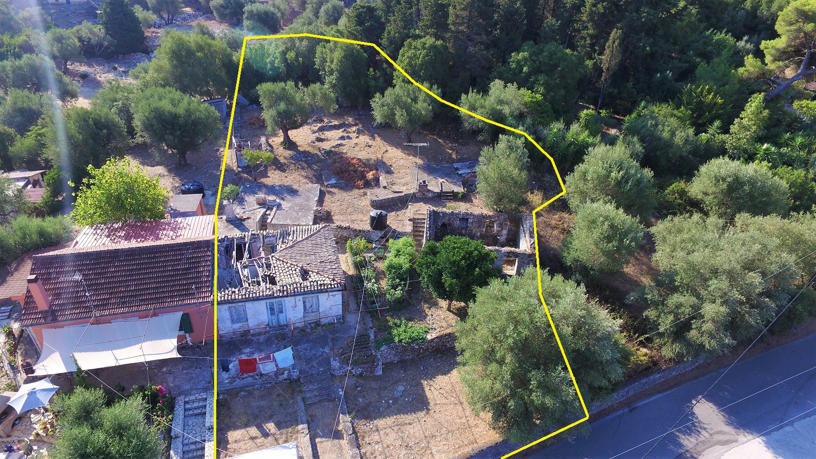 Aerial view of house and ruins for sale in Ithaca Greece