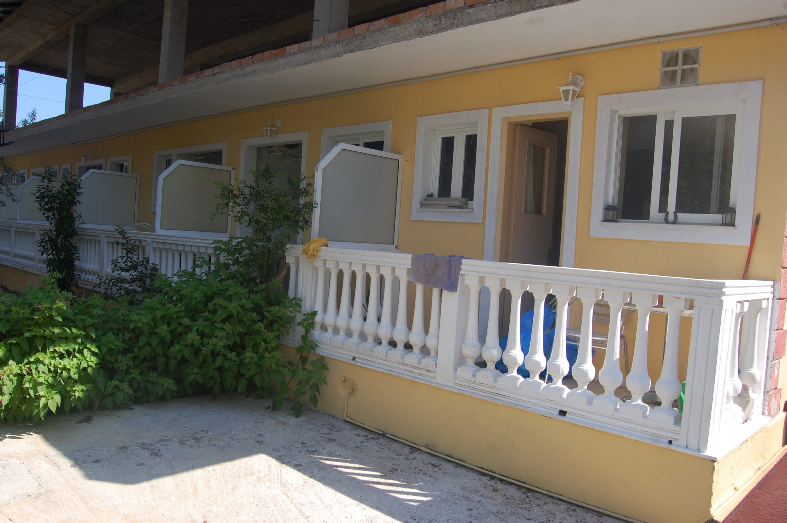 Exterior view of apartment complex for sale Ithaca Greece