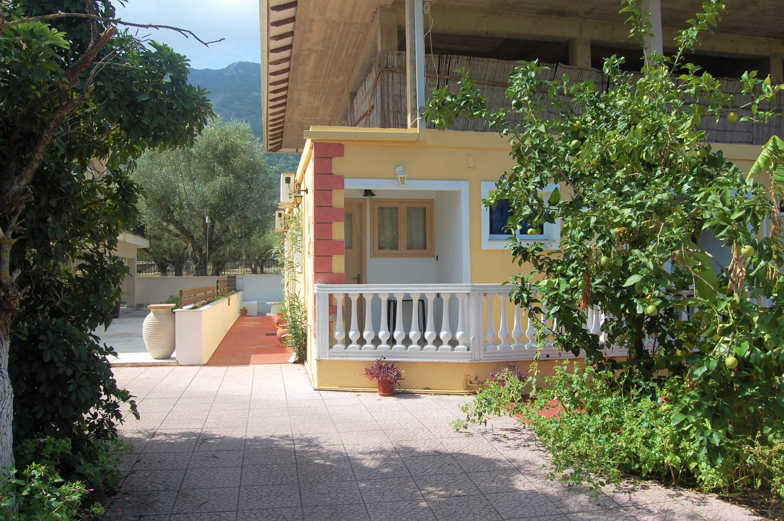 Exterior facade of apartment complex for sale in Ithaca Greece Vathi
