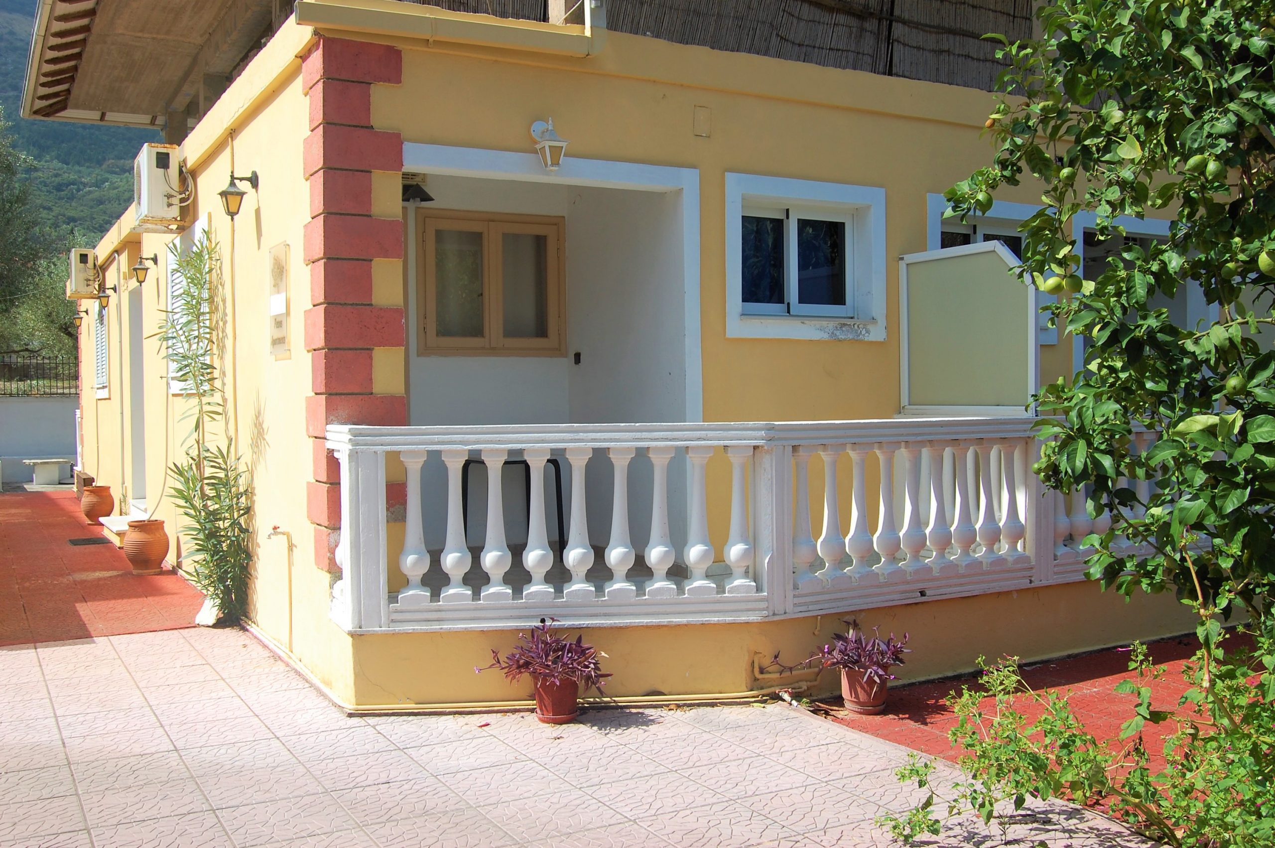 Exterior facade of apartment complex for sale in Ithaca Greece Vathi