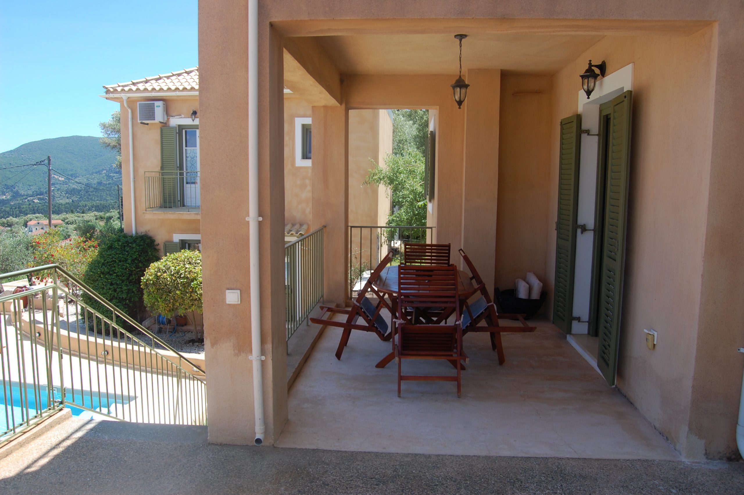 Exterior courtyard of Homer's View houses to rent MV Properties Ithaca Greece