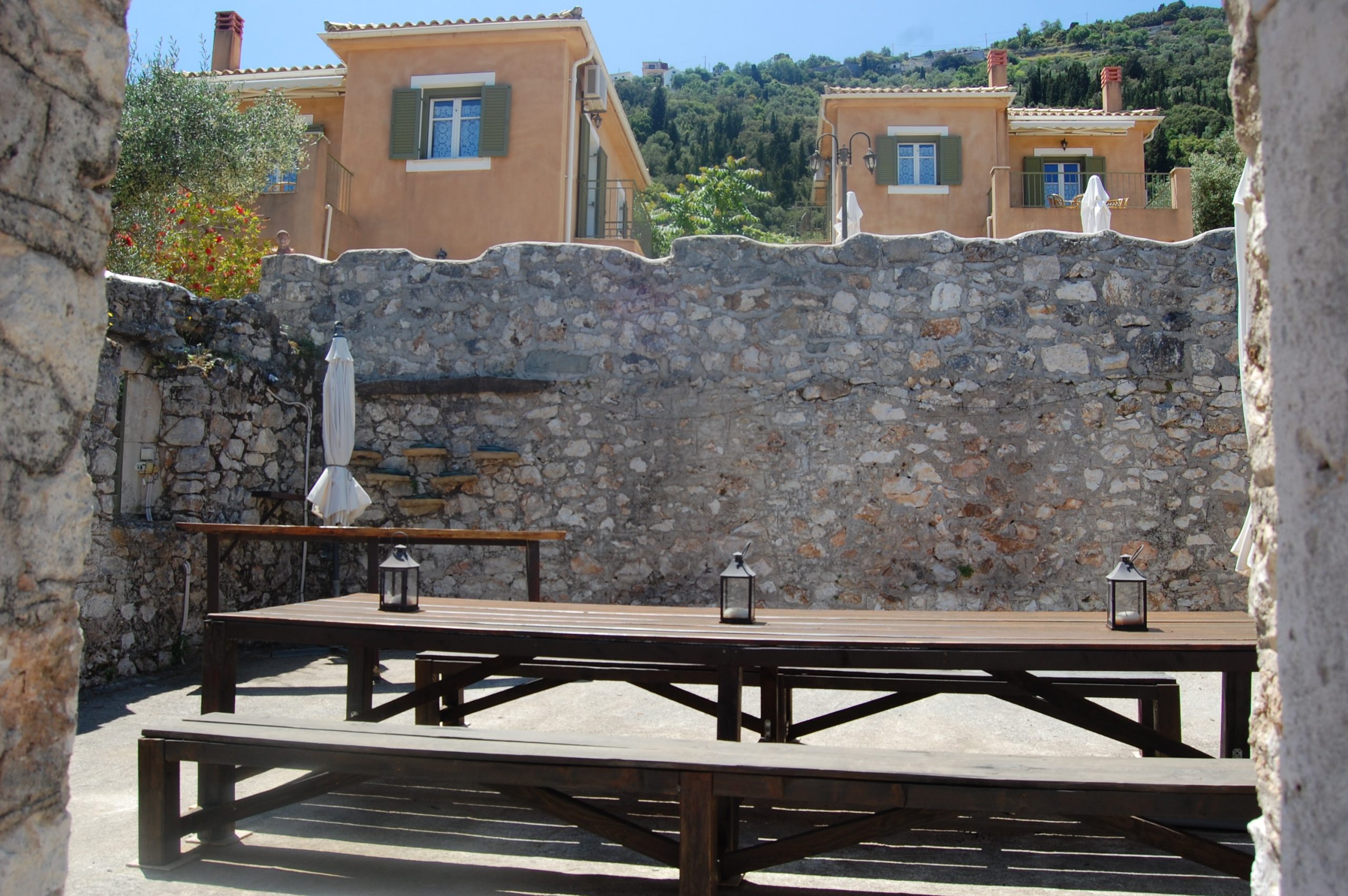 Exterior courtyard of Homer's View houses to rent MV Properties Ithaca Greece