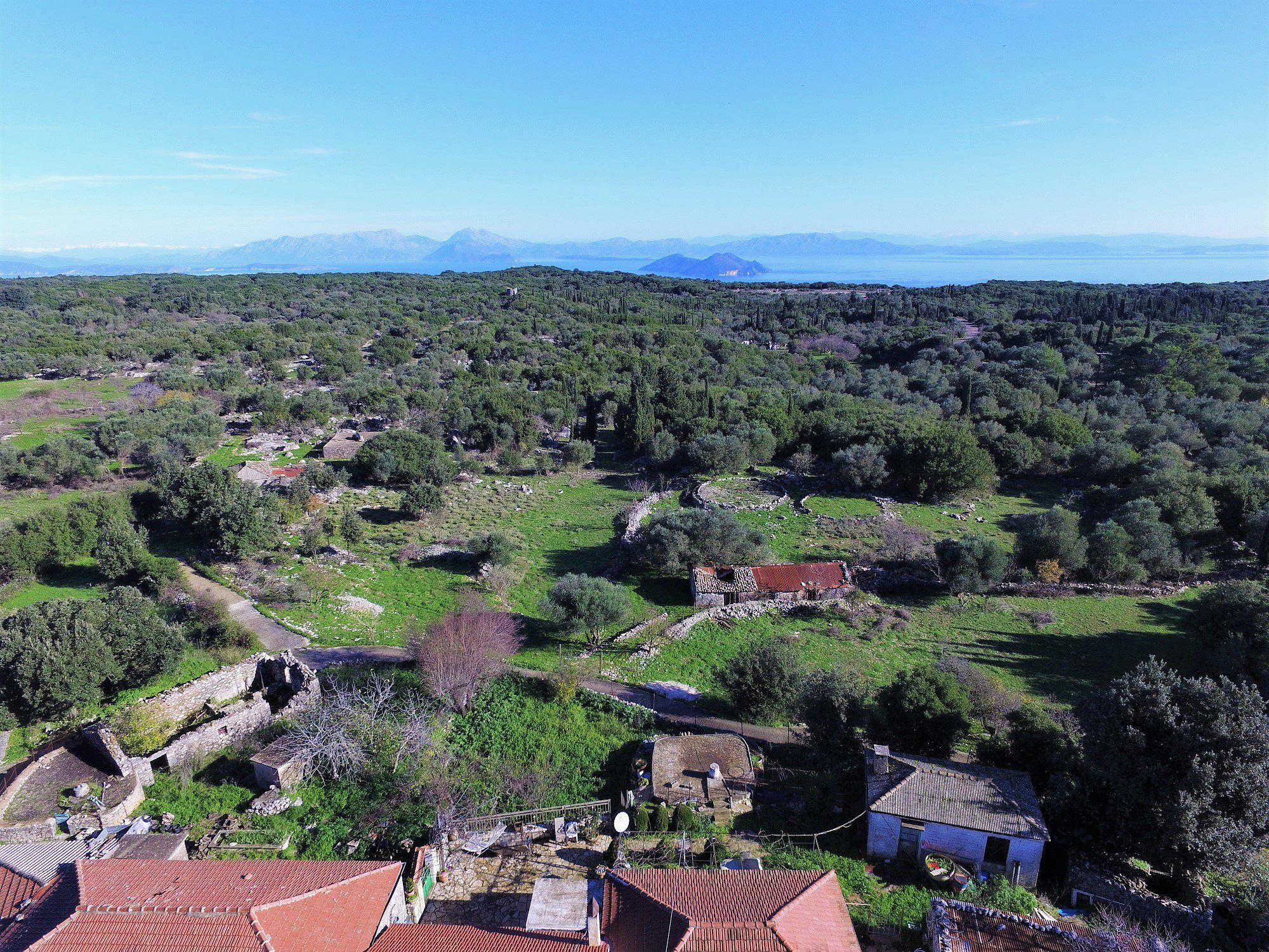 Aerial view of land with house for sale in Ithaca Greece