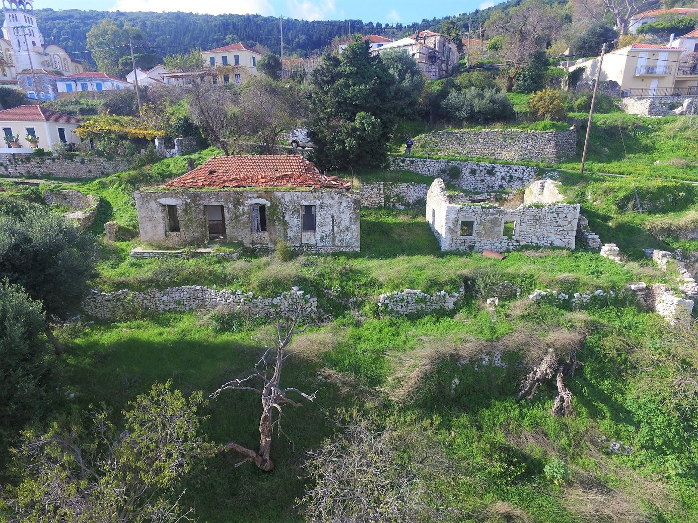 Aerial view of land and ruin for sale in Ithaca Greece Exoghi