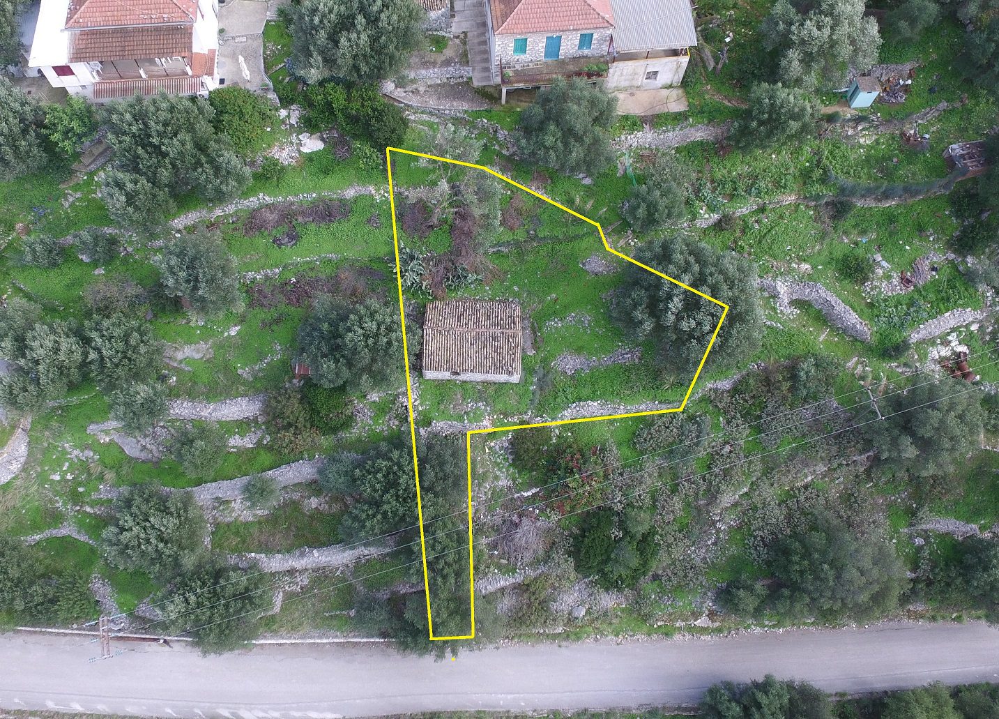 Aerial view of land with house for sale on Ithaca Greece