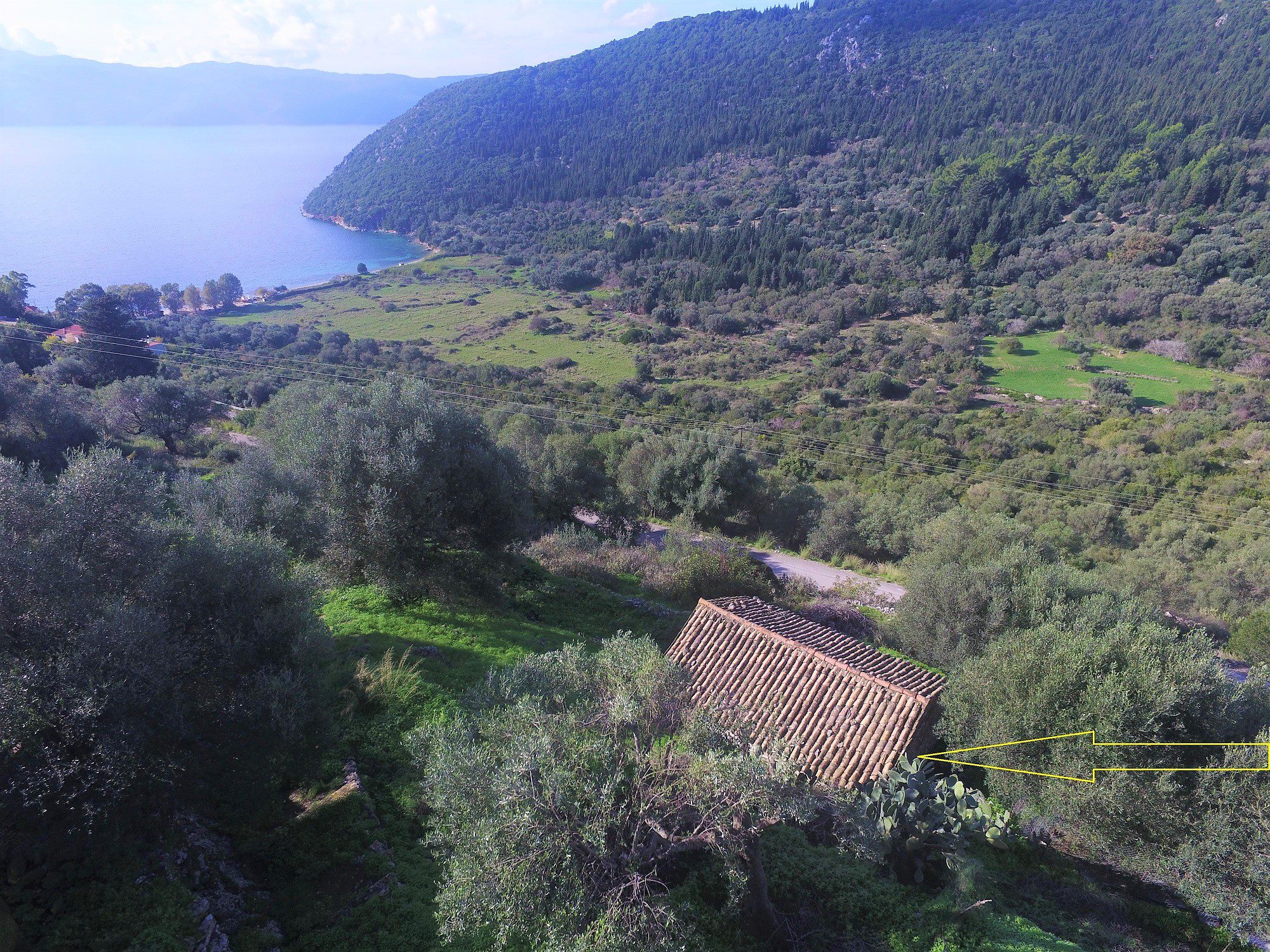 Aerial view of land with house for sale on Ithaca Greece