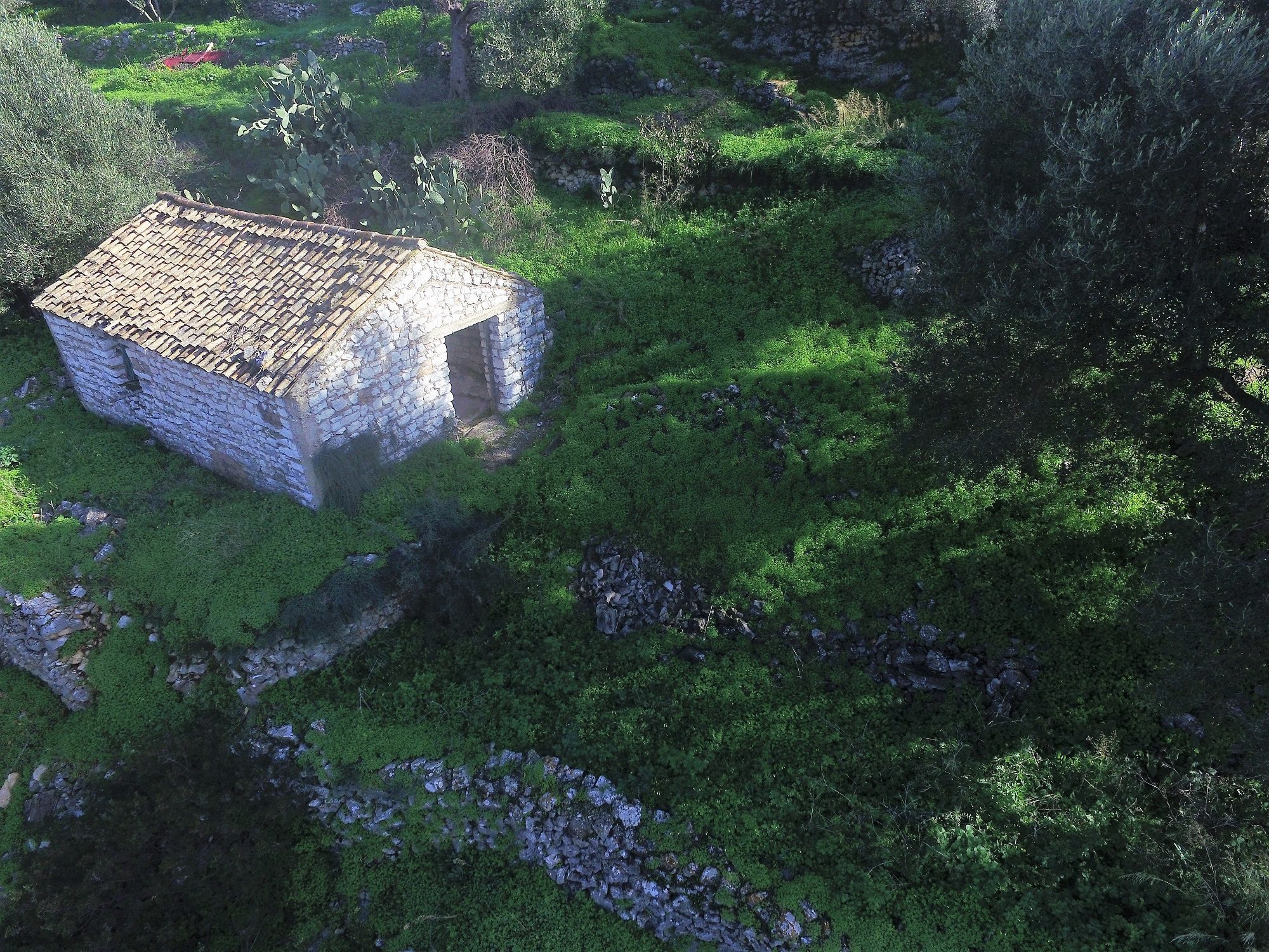 Aerial view of land with house for sale on Ithaca Greece