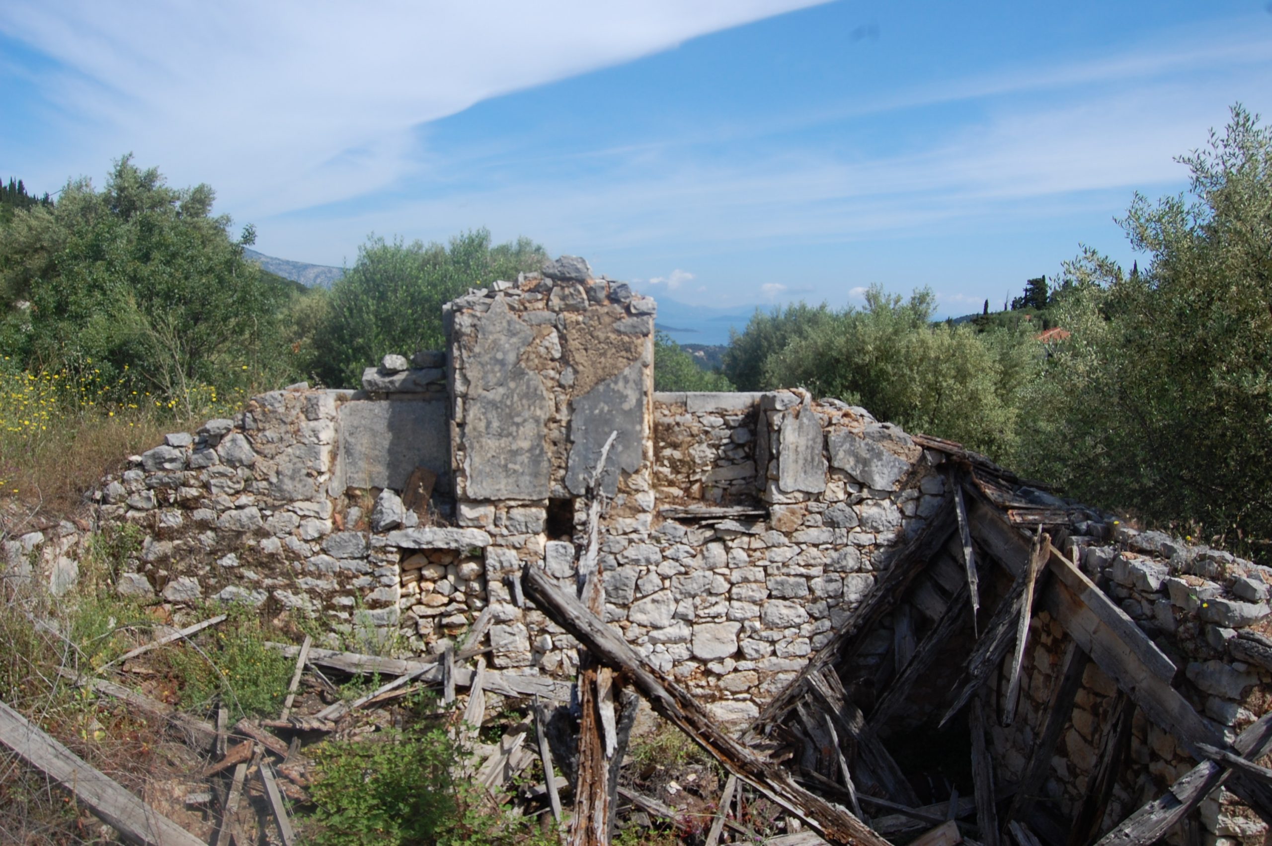 Exterior view of land with house for sale Ithaca Greece