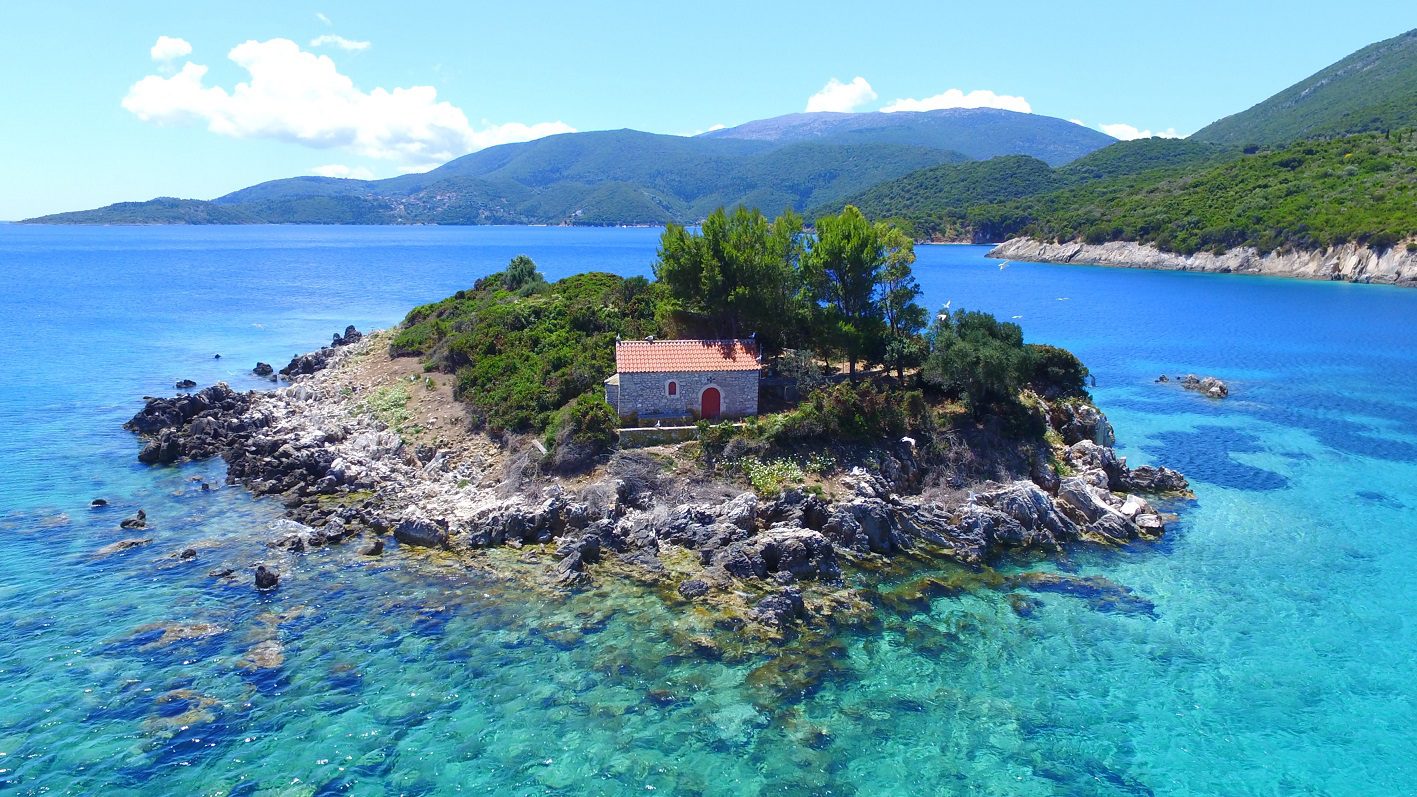 Aerial View of church off the coast of the land for sale in Ithaca Greece, Marmakas