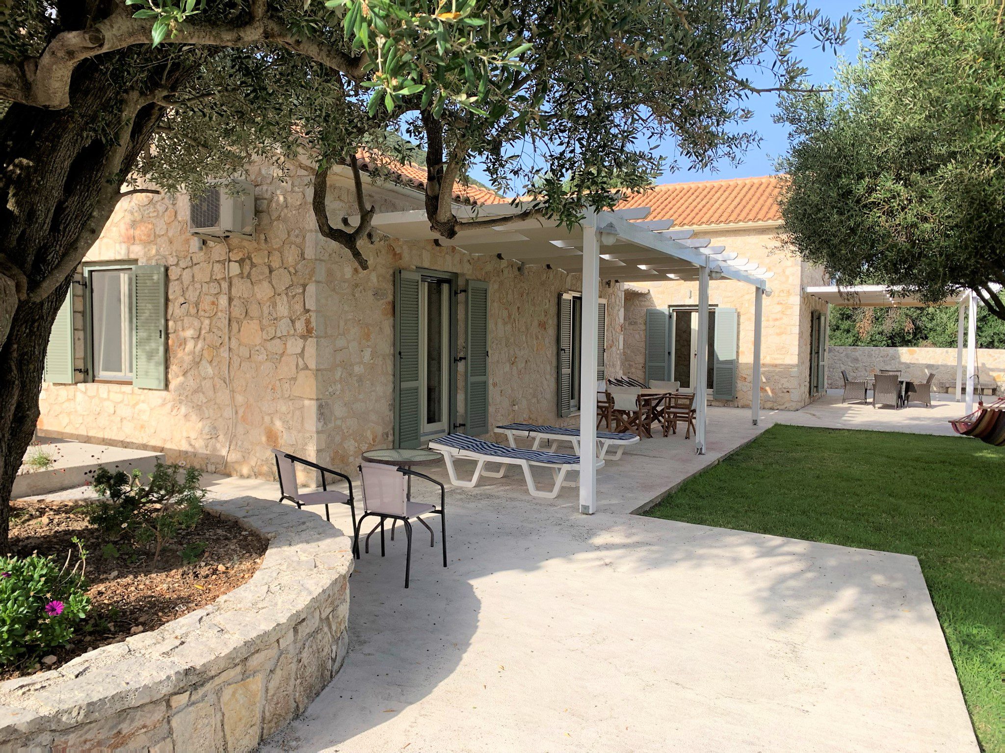 Front garden of holiday houses for rent on Ithaca Greece, Stavros