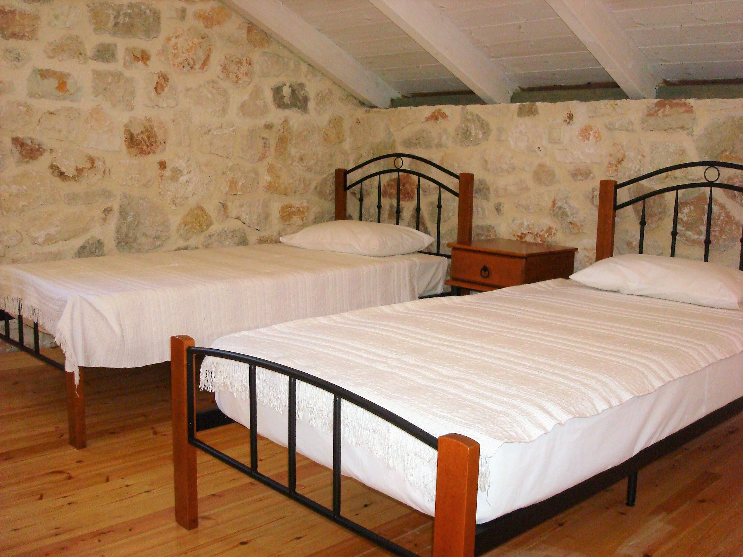 Interior bedroom of Kouvarata for rent MV Properties Ithaca Greece