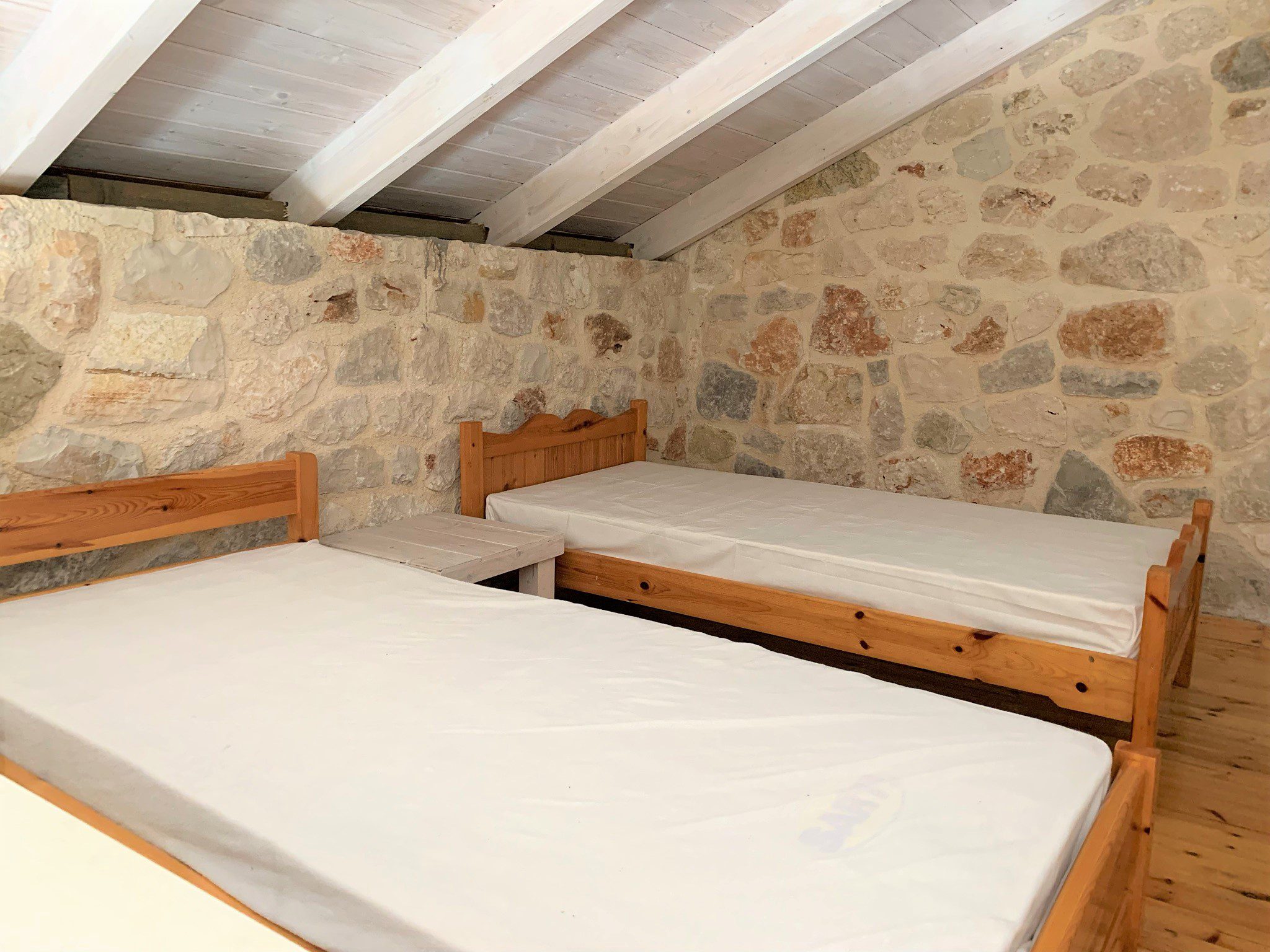 Attic bedroom of holiday houses for rent on Ithaca Greece, Stavros
