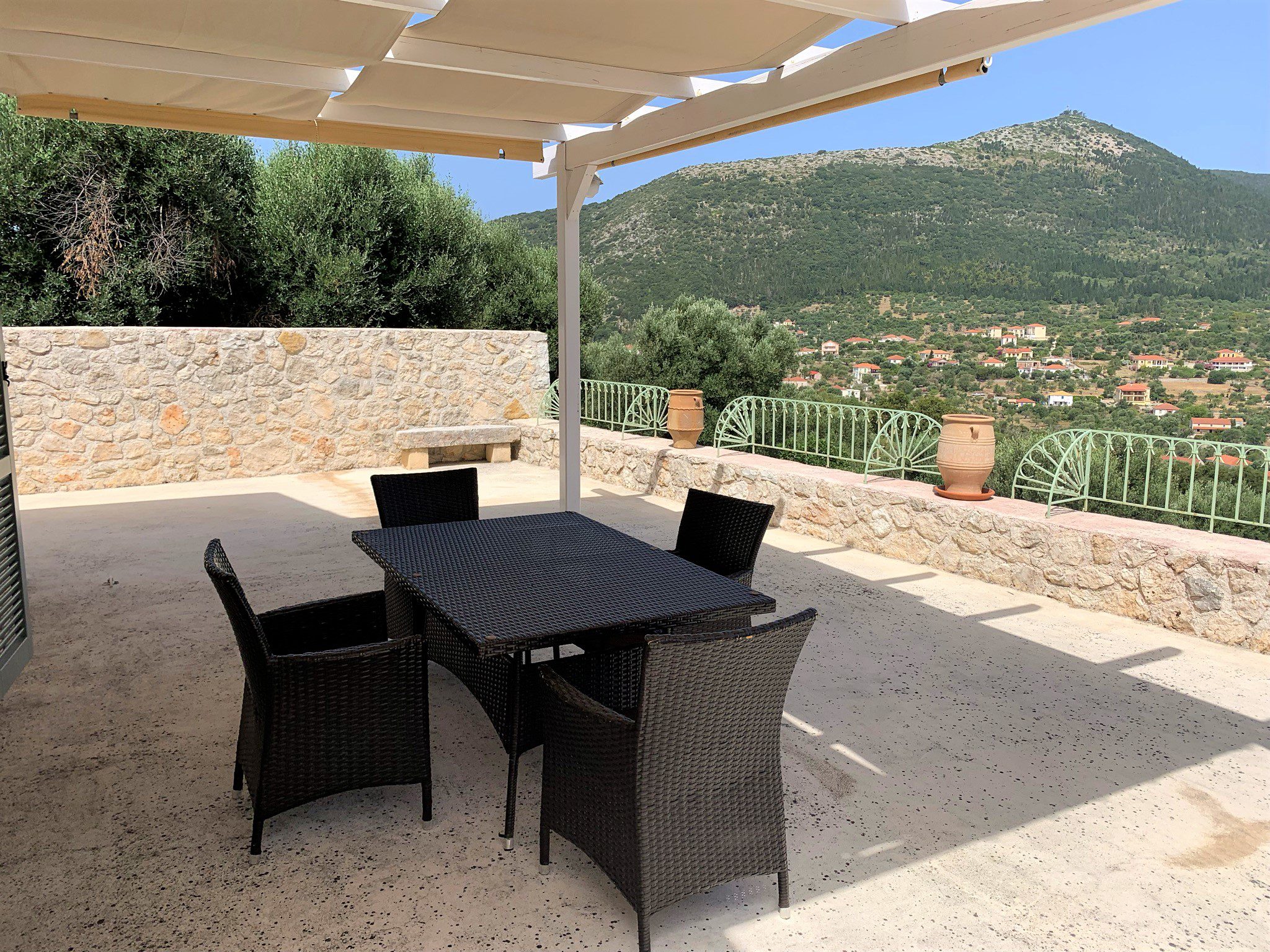 Front garden and sitting area of holiday houses for rent on Ithaca Greece, Stavros