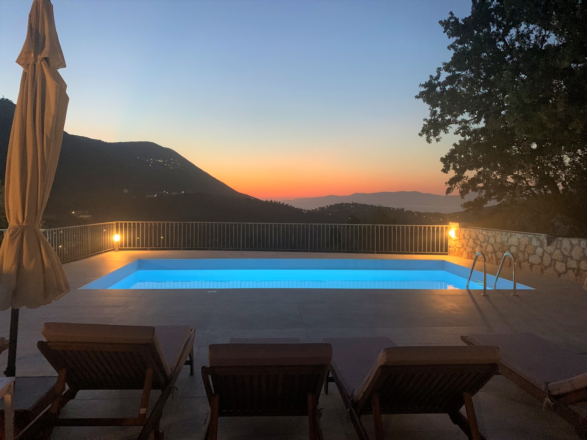 Sunset at swimming pools of villa for rent on Ithaca Greece, Stavros