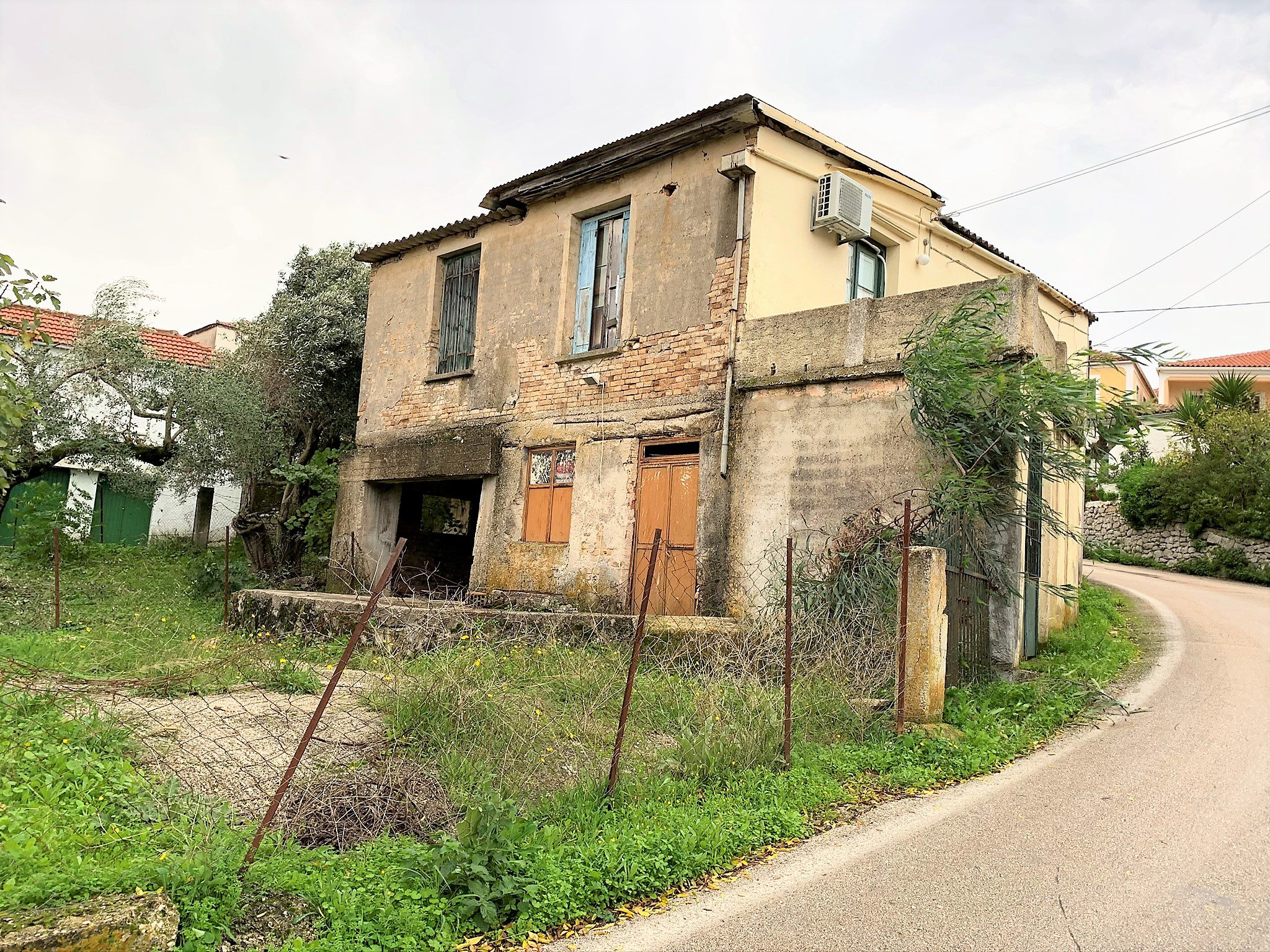 Exterior facade of building for sale in Ithaca Greece, Stavros