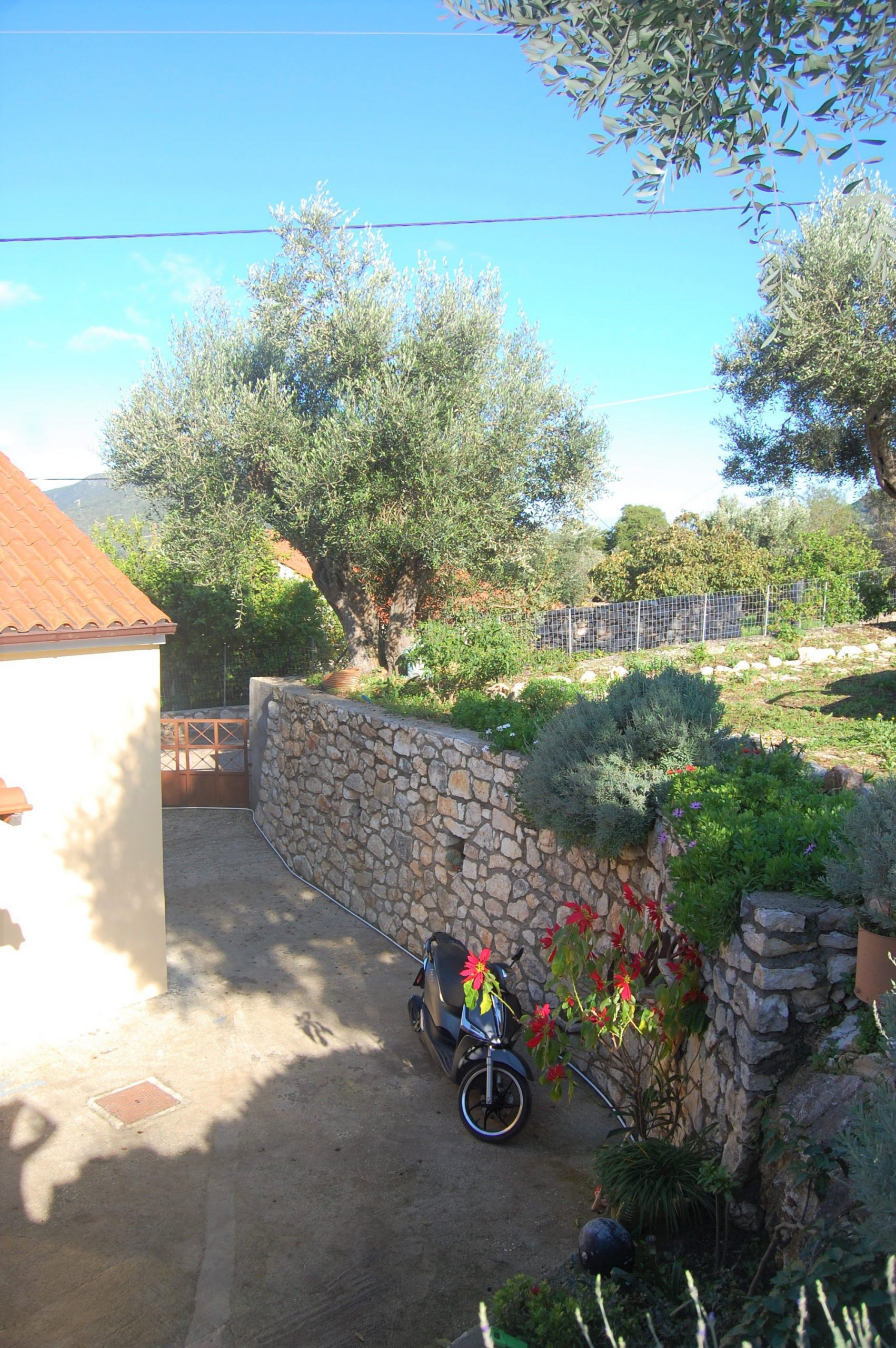 Stone courtyard of house for sale in Ithaca Greece Stavros