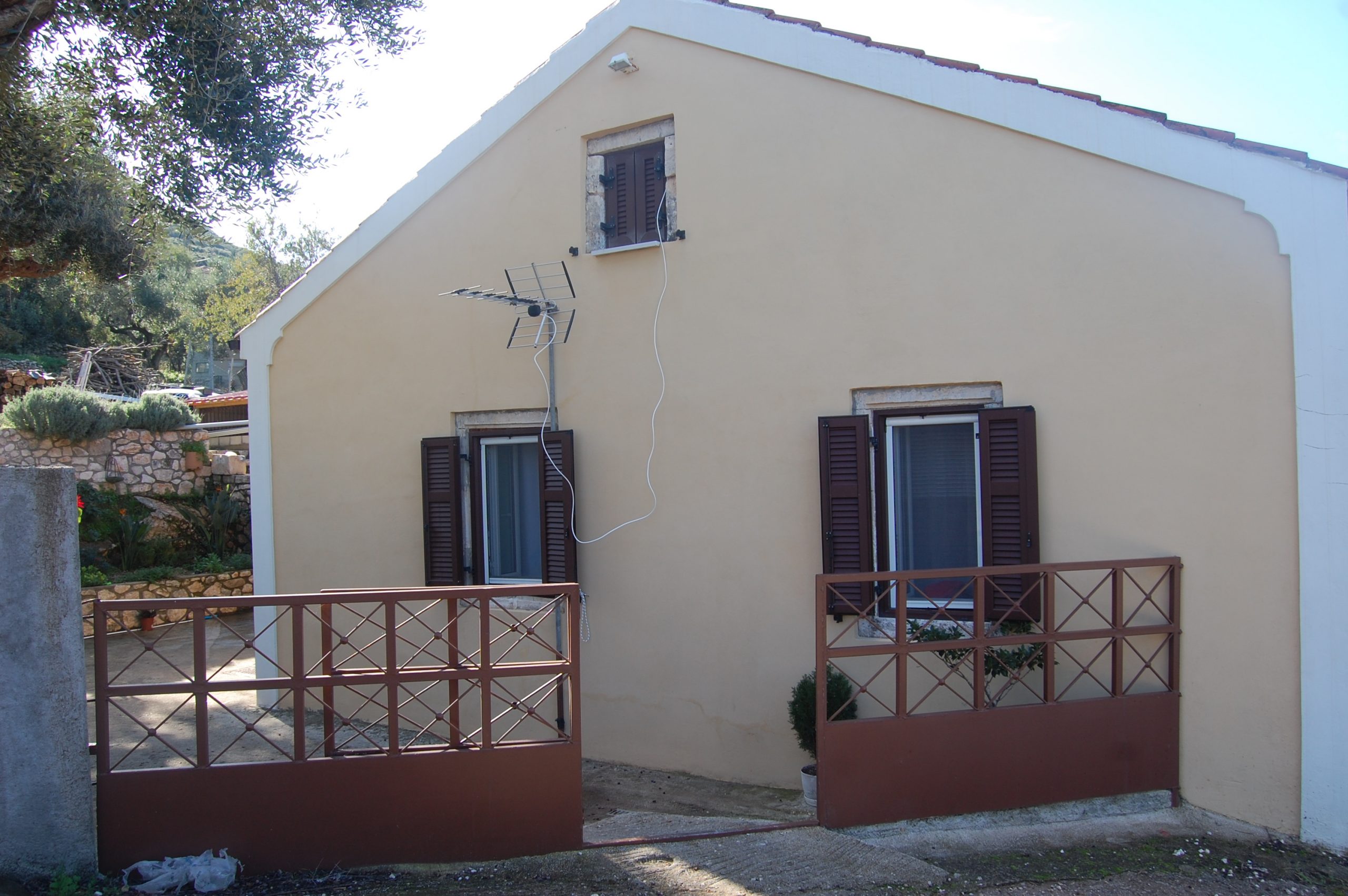Exterior facade of house for sale in Ithaca Greece, Stavros