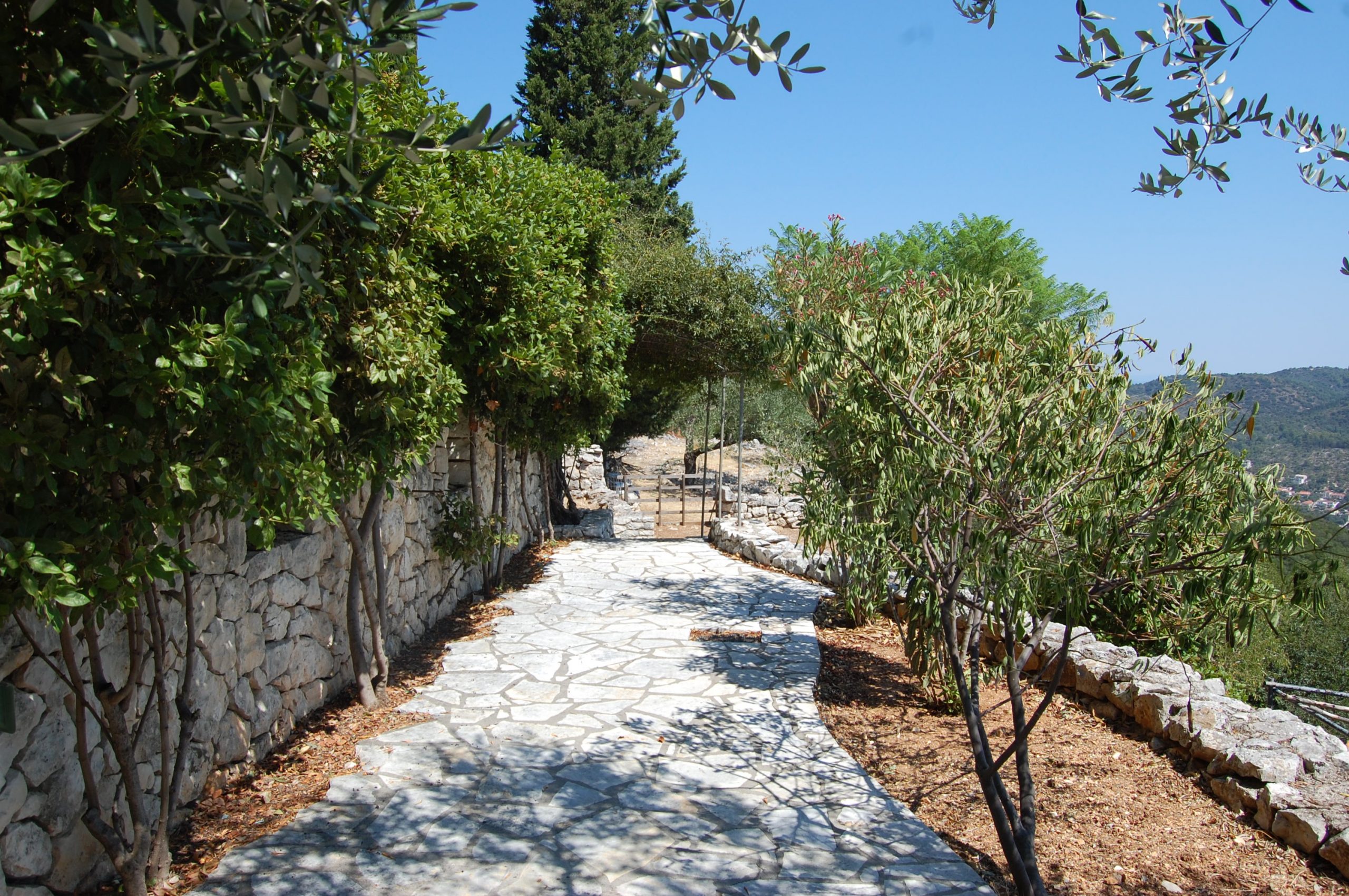 Stone terrace with view of property for sale in Ithaca Greece Perachori