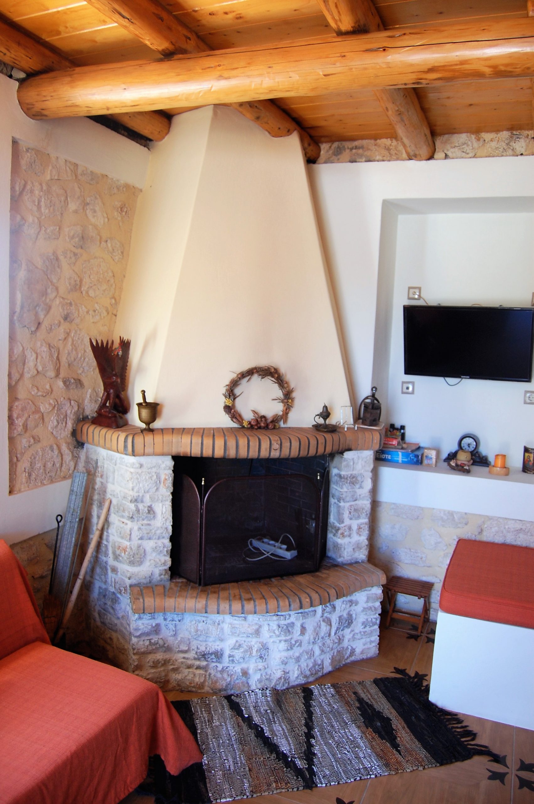 Fireplace of stone house for rent Ithaca Greece