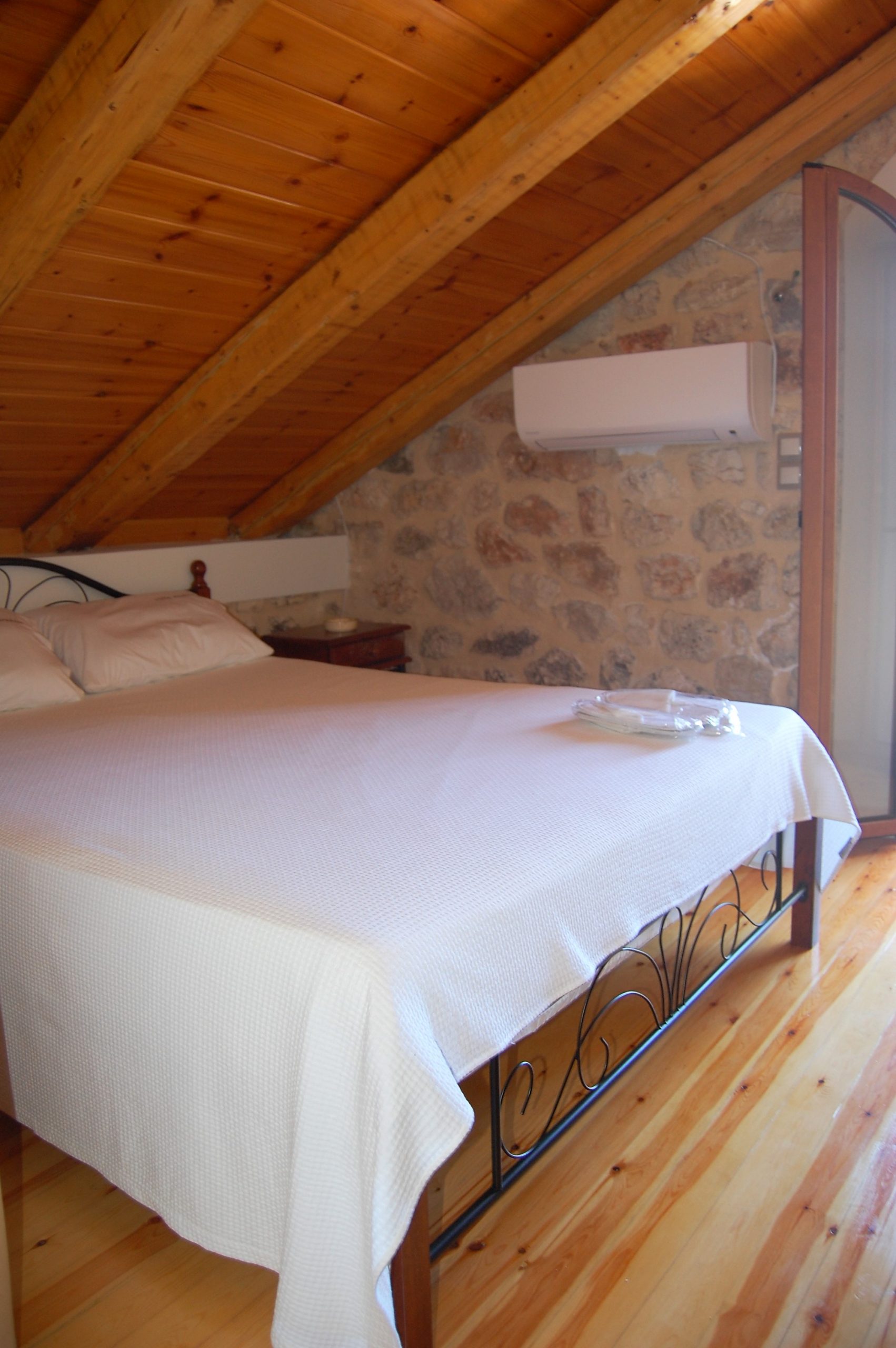 Double bedroom of stone house for rent Ithaca Greece