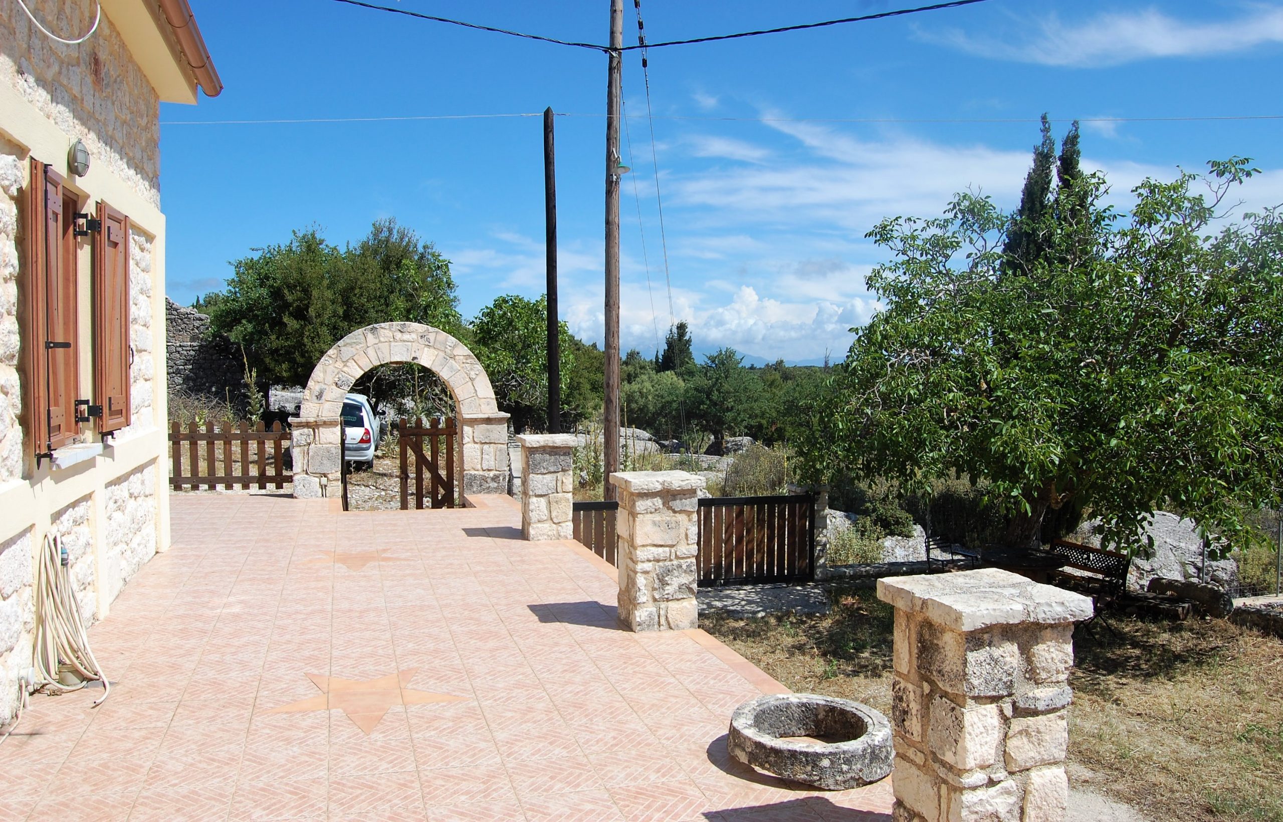 Outdoor patio of stone house for rent Ithaca Greece