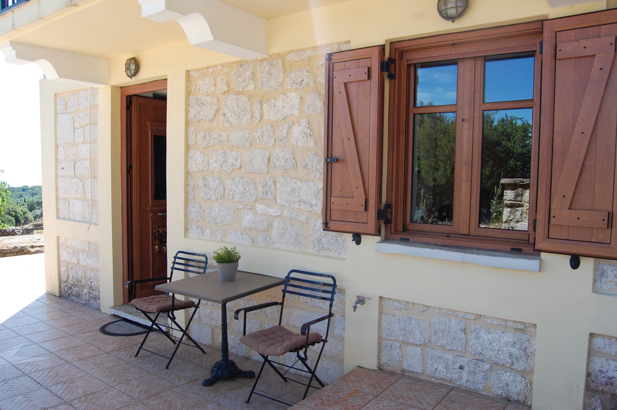 Outdoor patio of stone house for rent Ithaca Greece