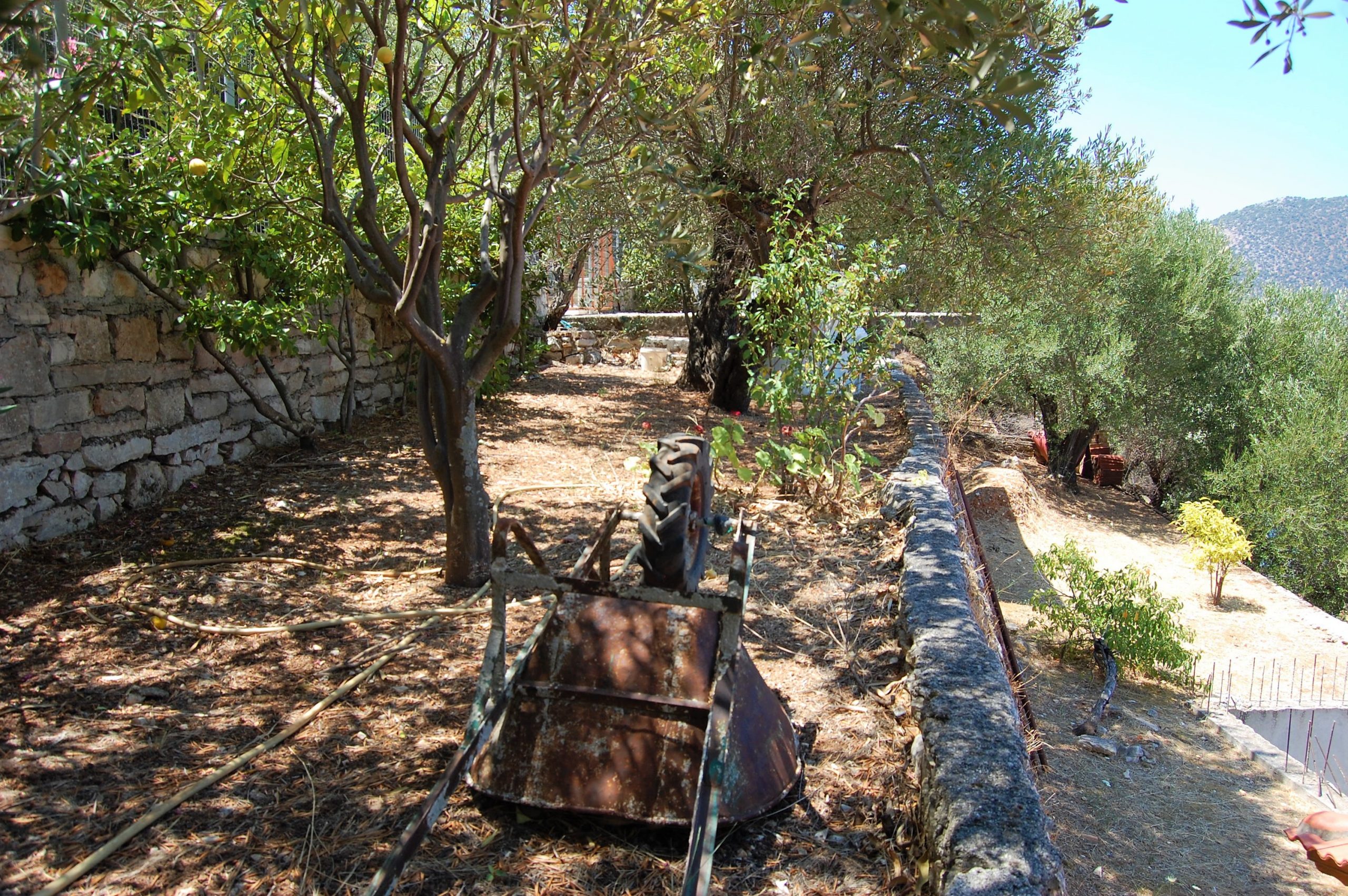 Exterior and terrace of coastal house for sale in Ithaca Greece Vathi