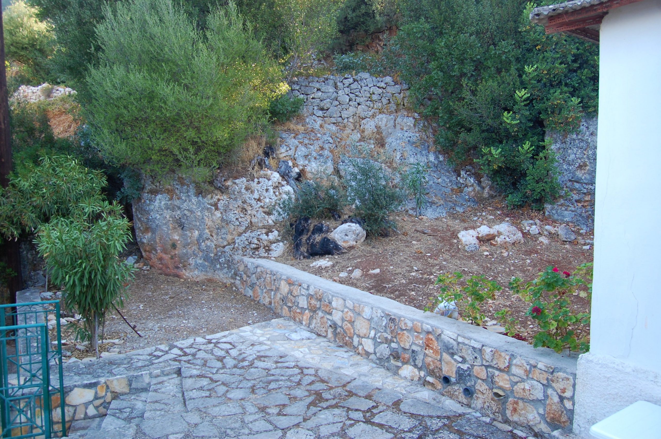 Natural stone terraced walls of house for sale in Ithaca Greece, Lefki
