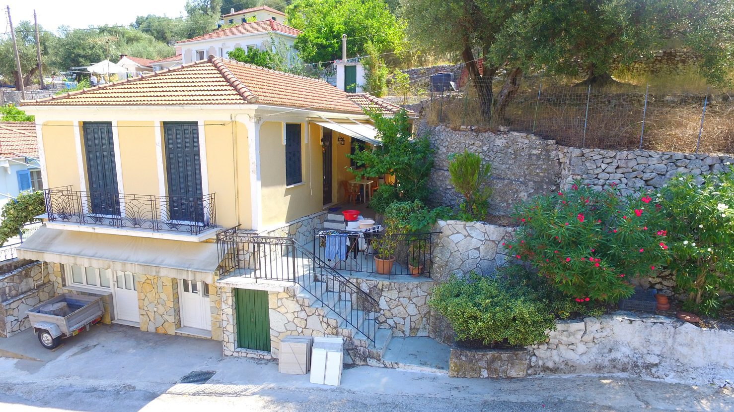 Aerial view of facade of house for sale on Ithaca Greece, Perachori