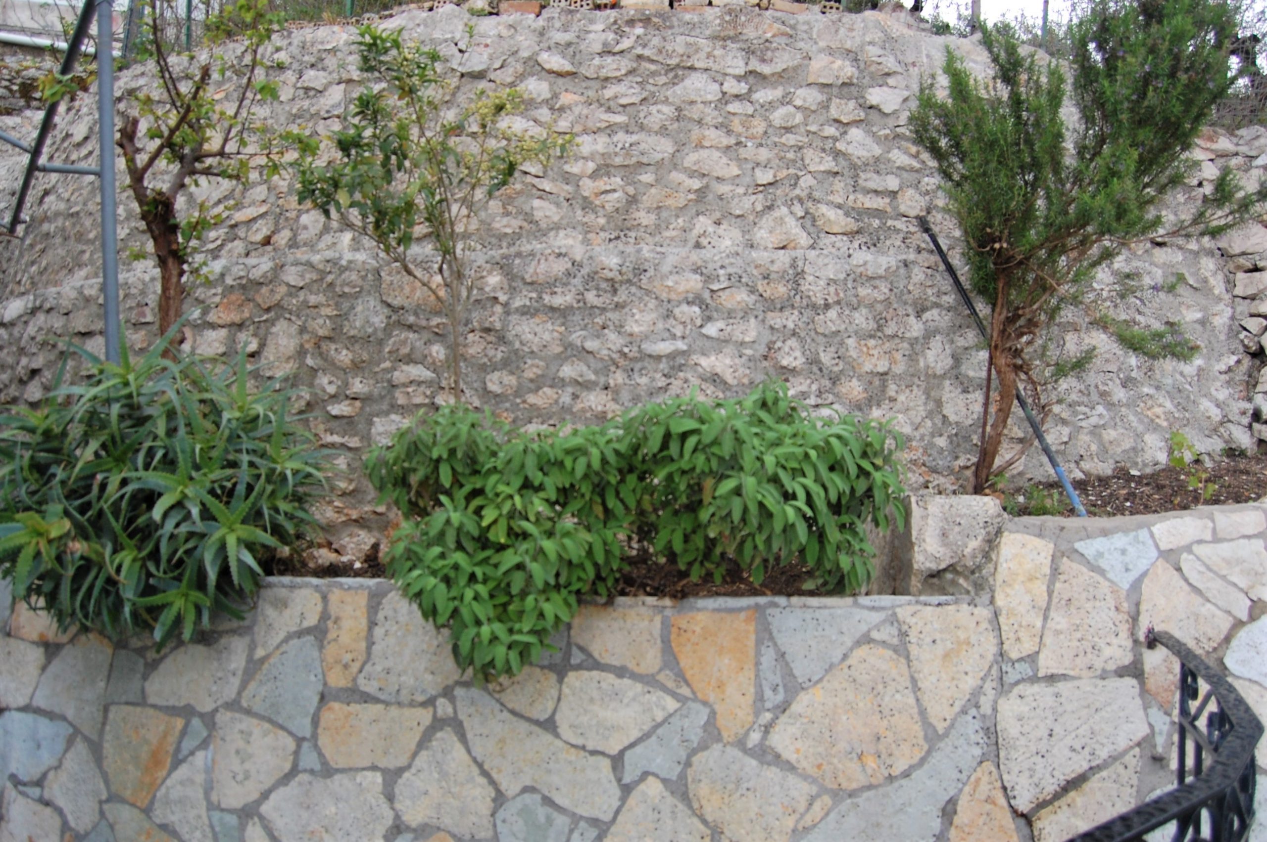 stone wall feature of house for sale in Ithaca Greece, Perachori