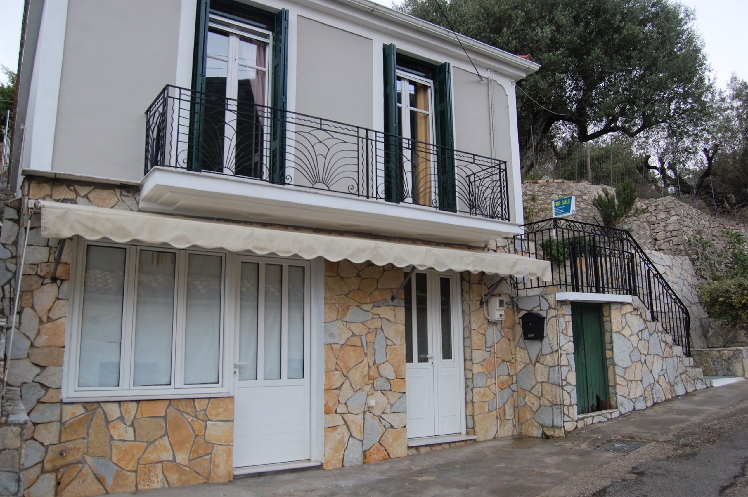 Front exterior of house for sale in Ithaca Greece, Perachori