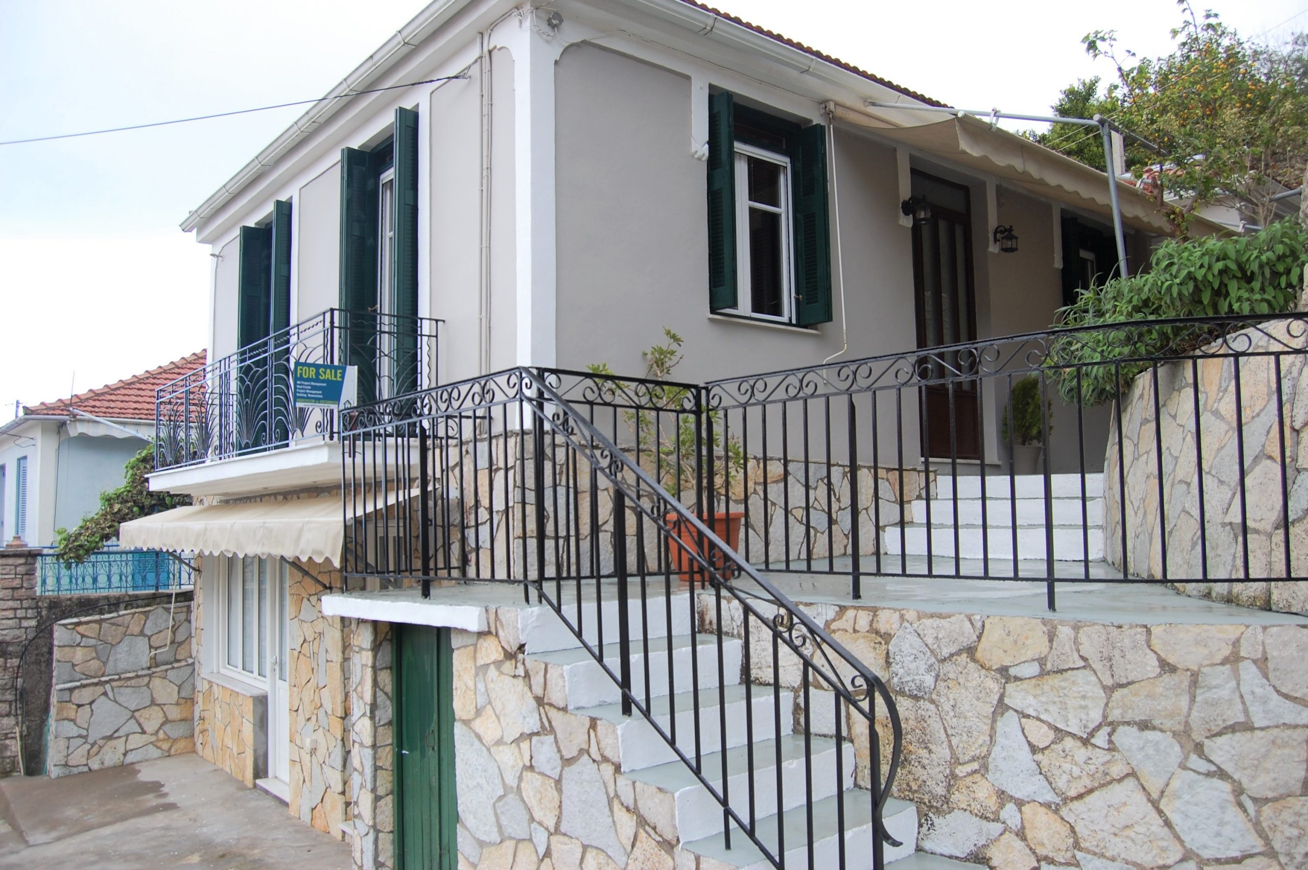 Front exterior of house for sale in Ithaca Greece, Perachori
