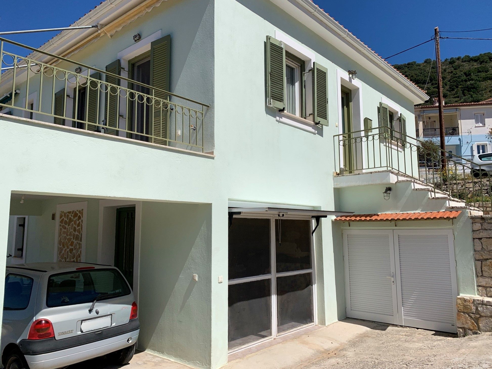 Exterior facade of house for sale in Ithaca Greece, Vathi