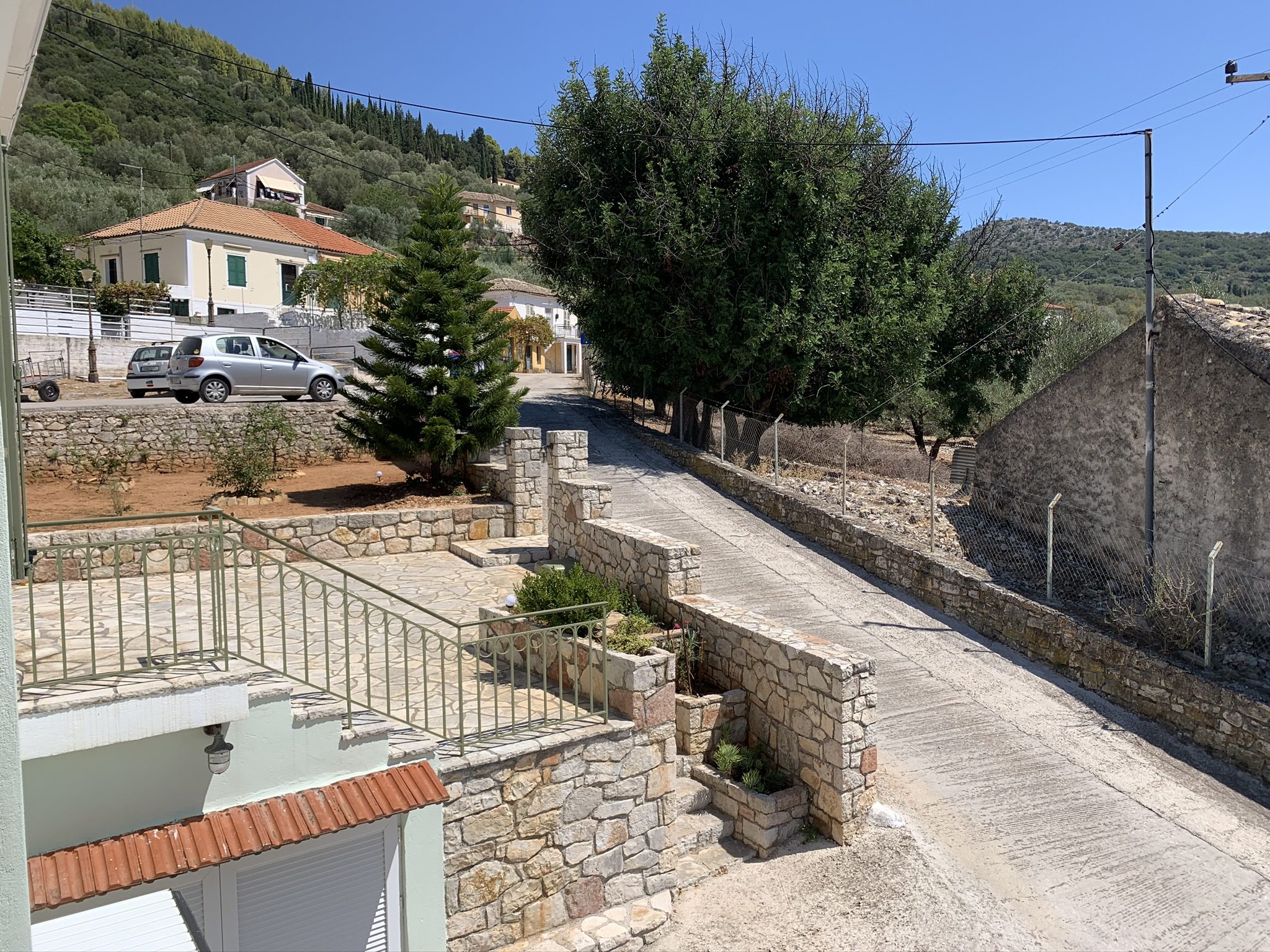 Exterior stone terrace of house for sale in Ithaca Greece, Vathi
