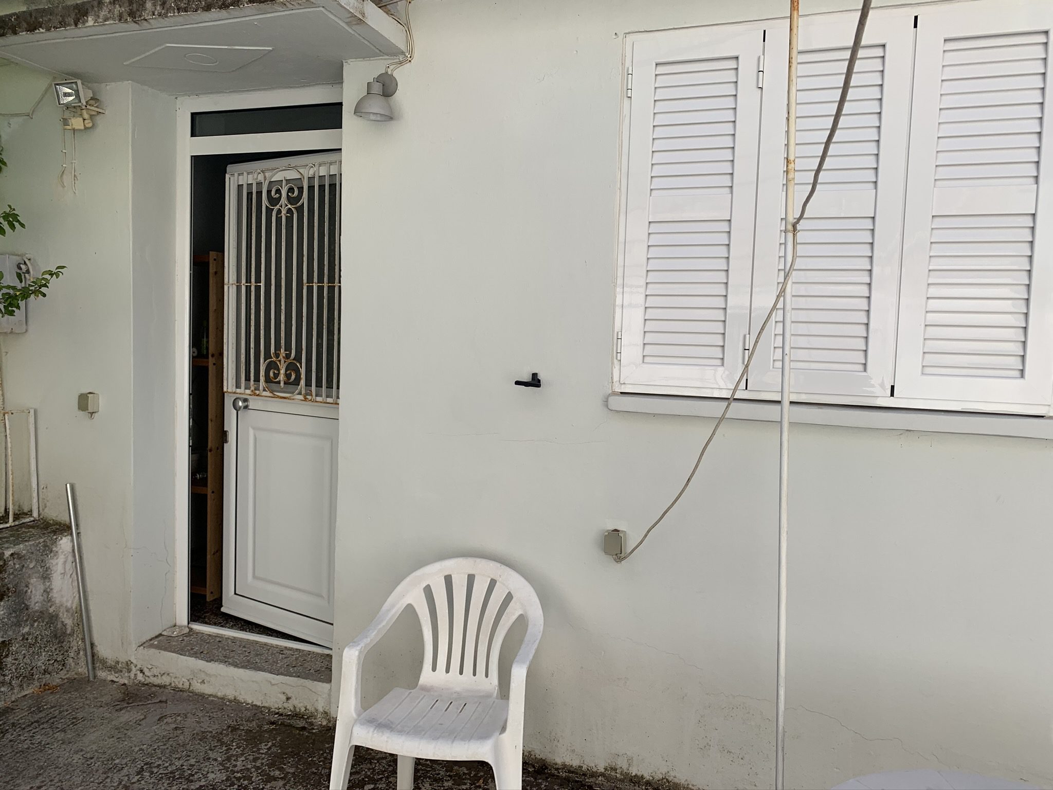 Entrance and front door of house for sale in Ithaca Greece, Stavros