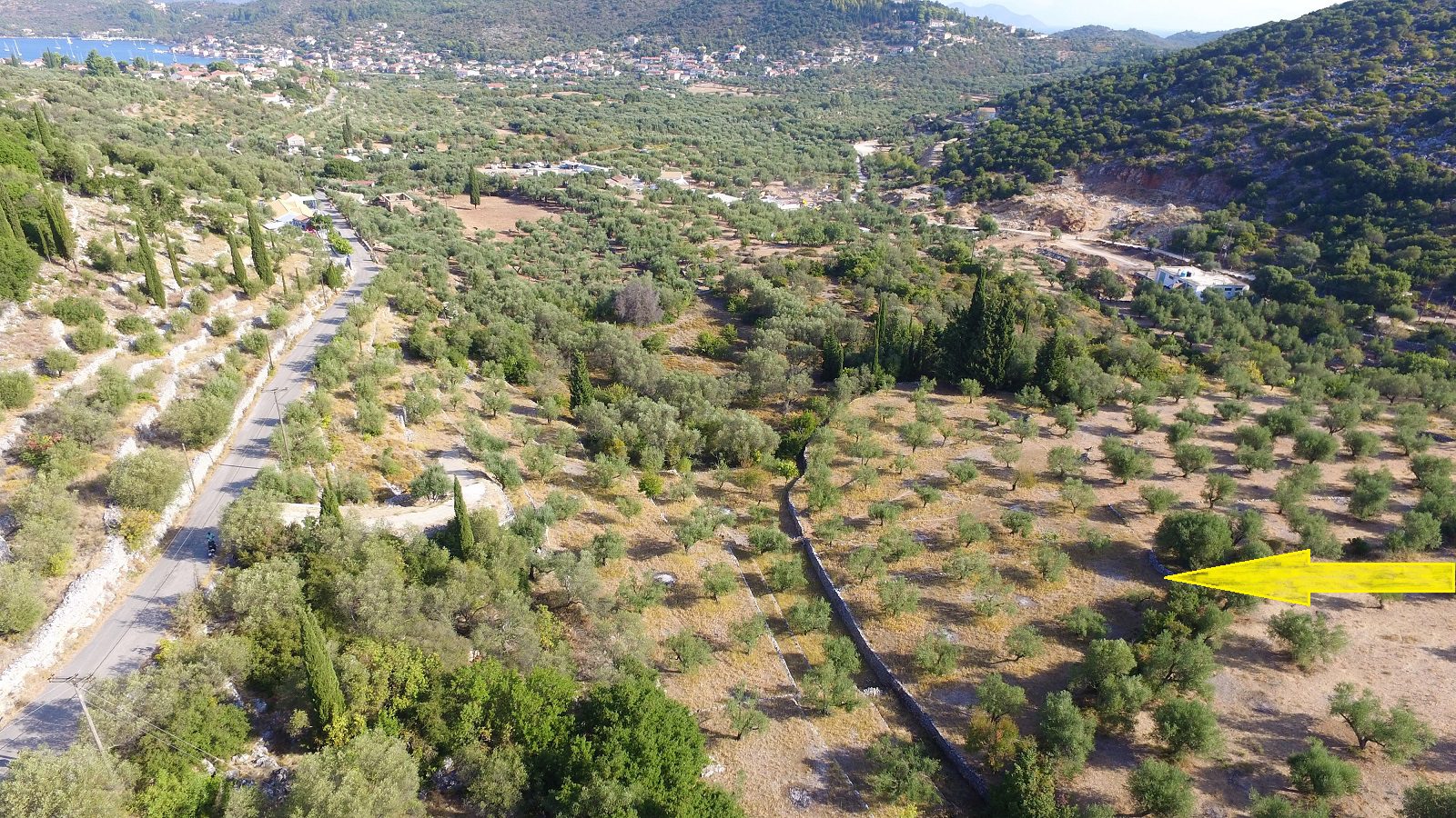 Aerial view with border of land for sale Ithaca Greece in Vathi