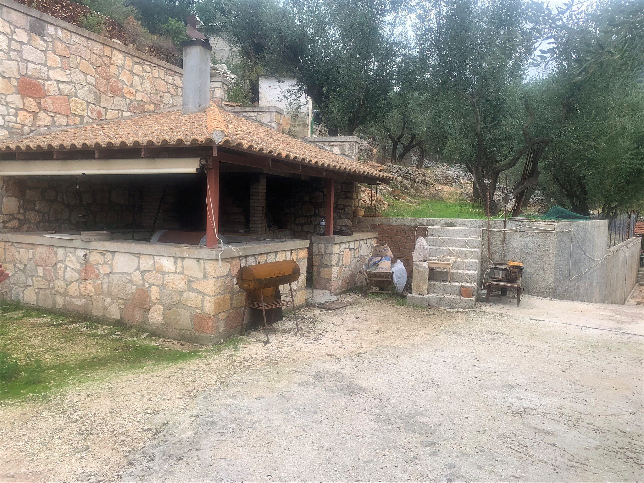 Outdoor barbeque of house for sale in Ithaca Greece, Perachori