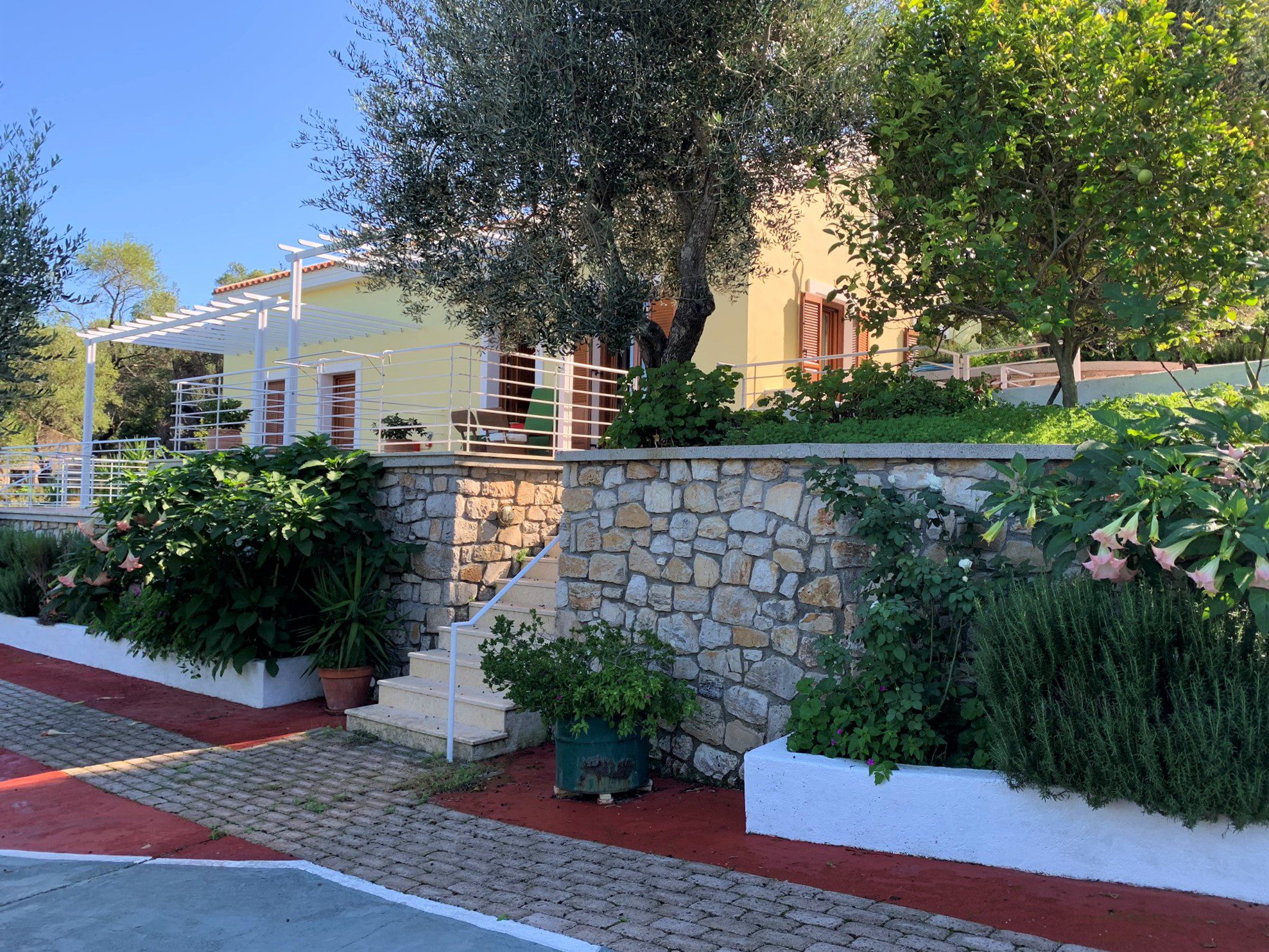 Exterior facade and garden of holiday house for rent in Ithaca Greece, Frikes