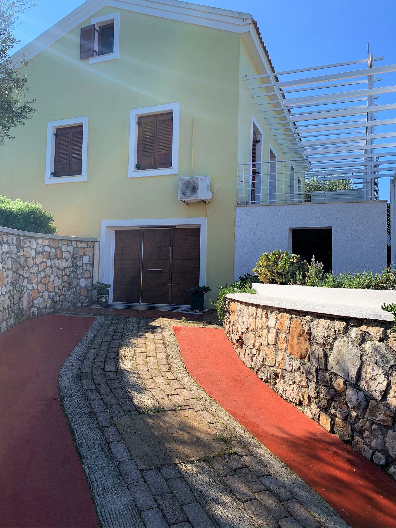 Exterior facade and garden of holiday house for rent in Ithaca Greece, Frikes