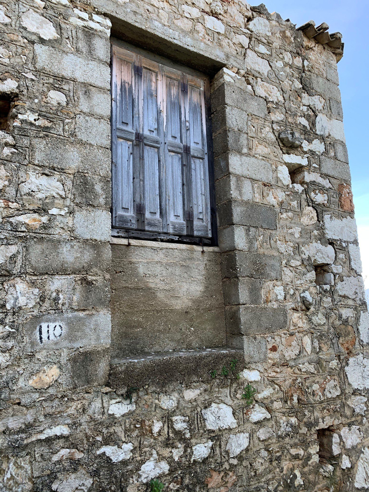 Stone facade of house for sale in Ithaca Greece, Lefki