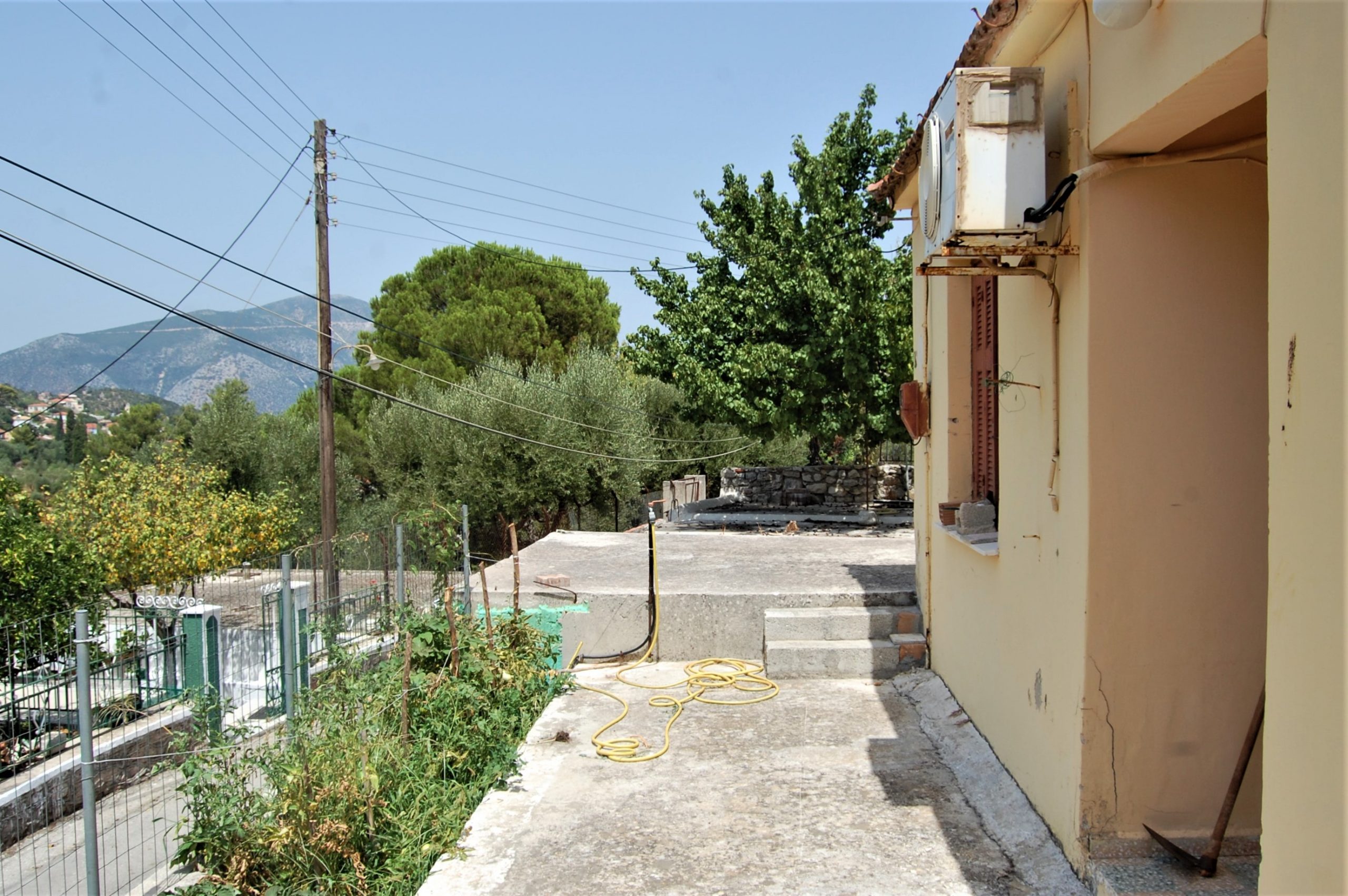 Side outside space of house for sale Ithaca Greece, Vathi