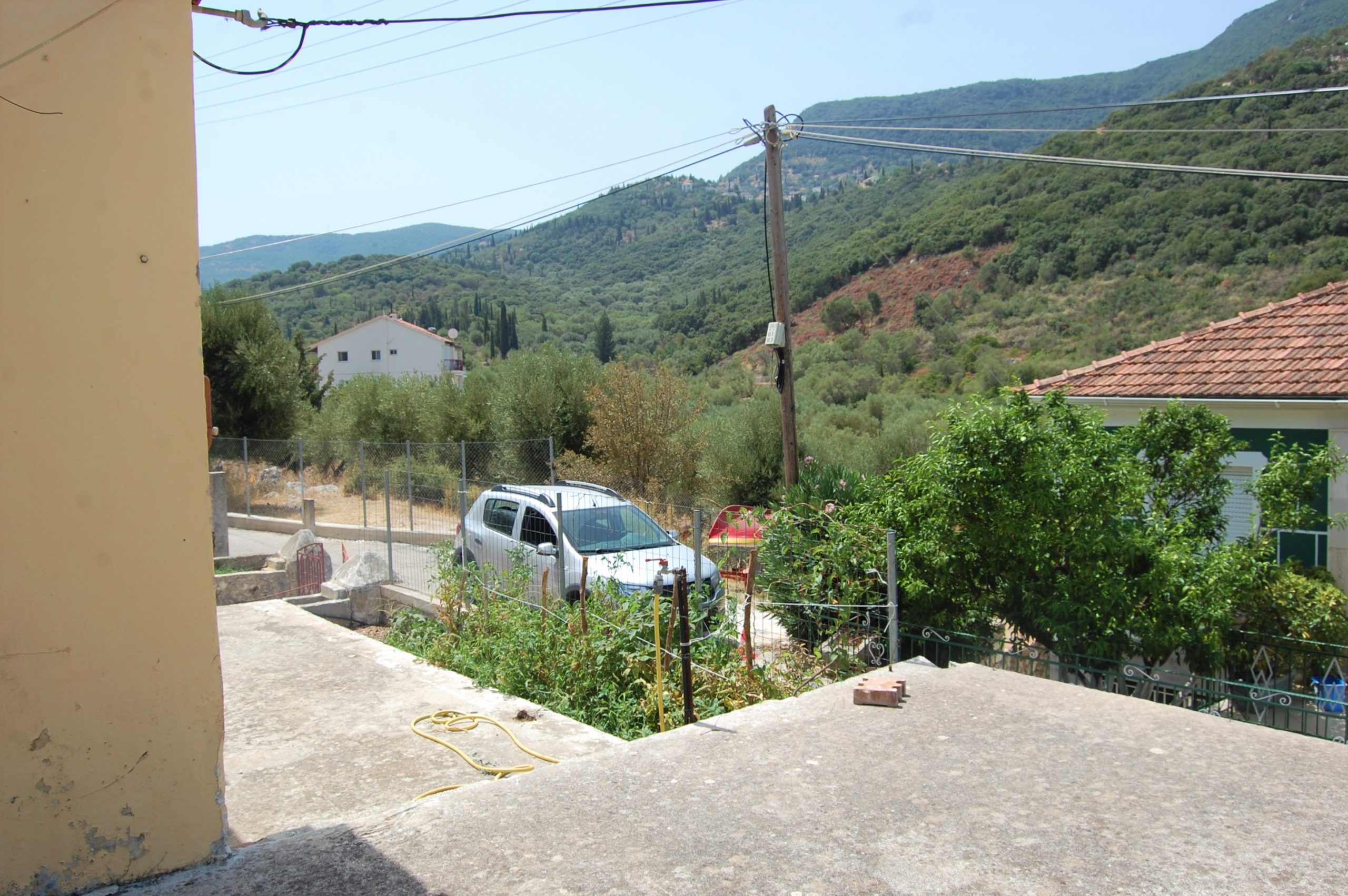 Side outside space of house for sale Ithaca Greece, Vathi