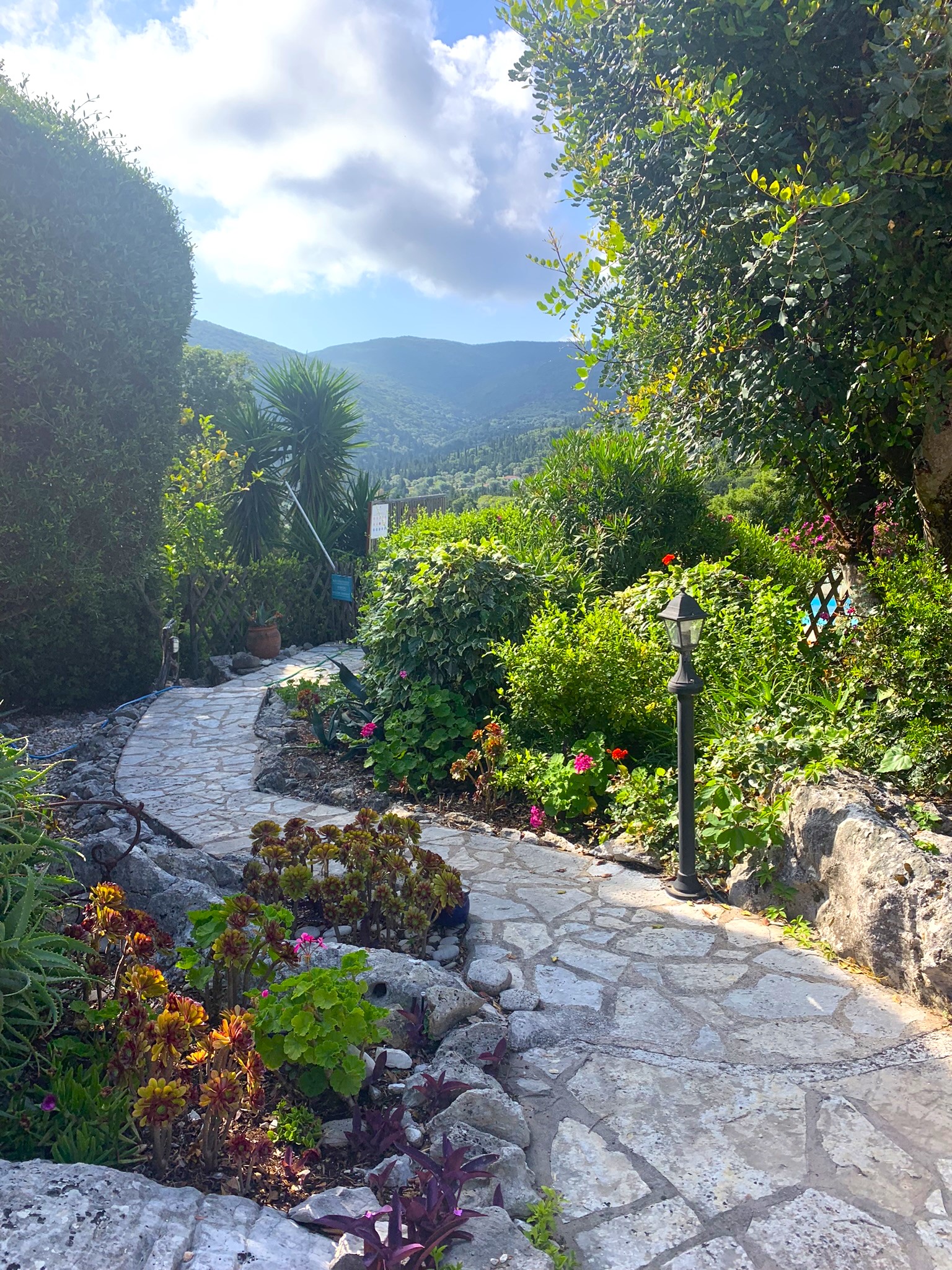 Garden pathway of house for sale in Ithaca Greece, Lahos