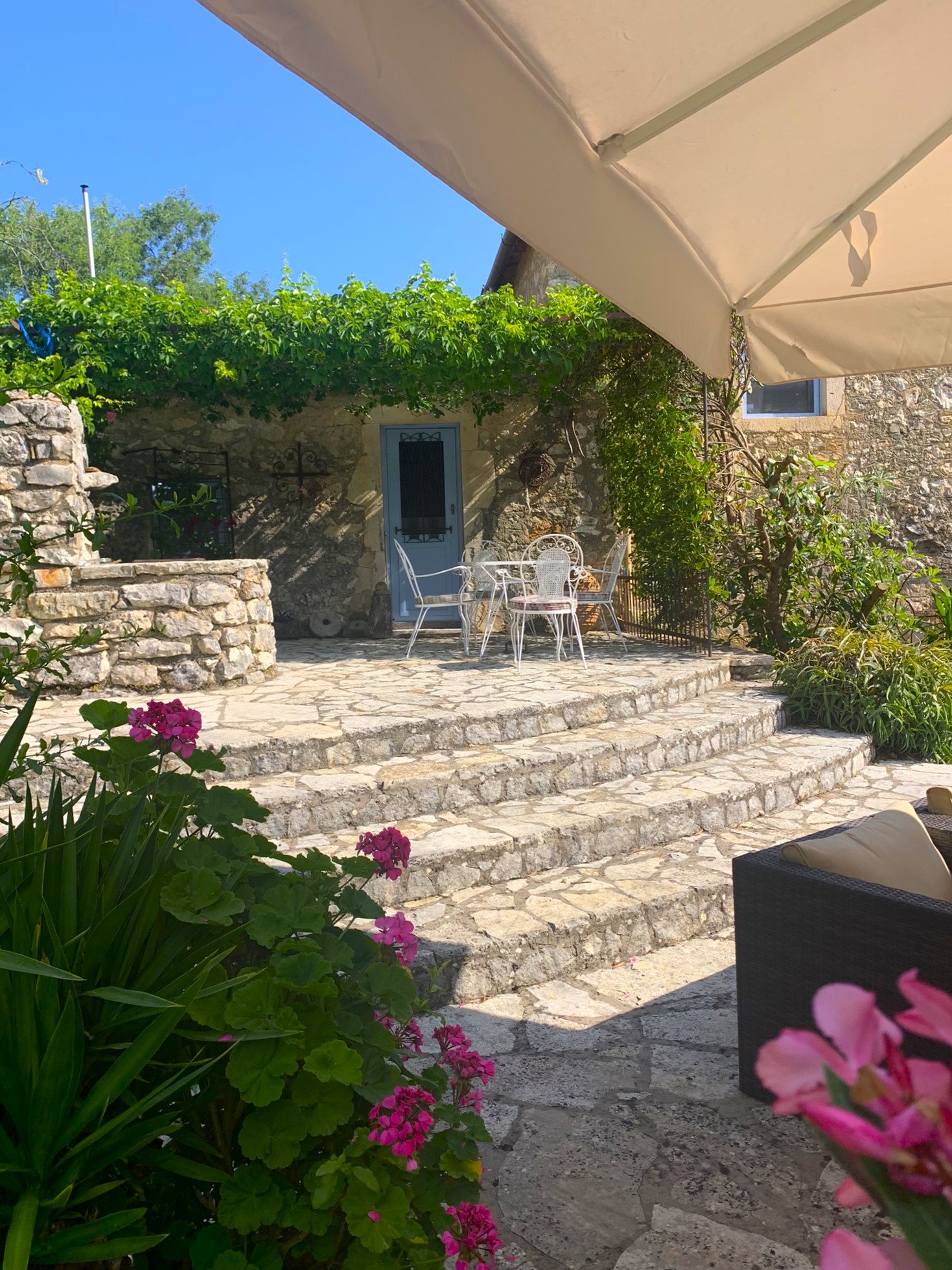 Back garden patio of house for sale in Ithaca Greece, Lahos