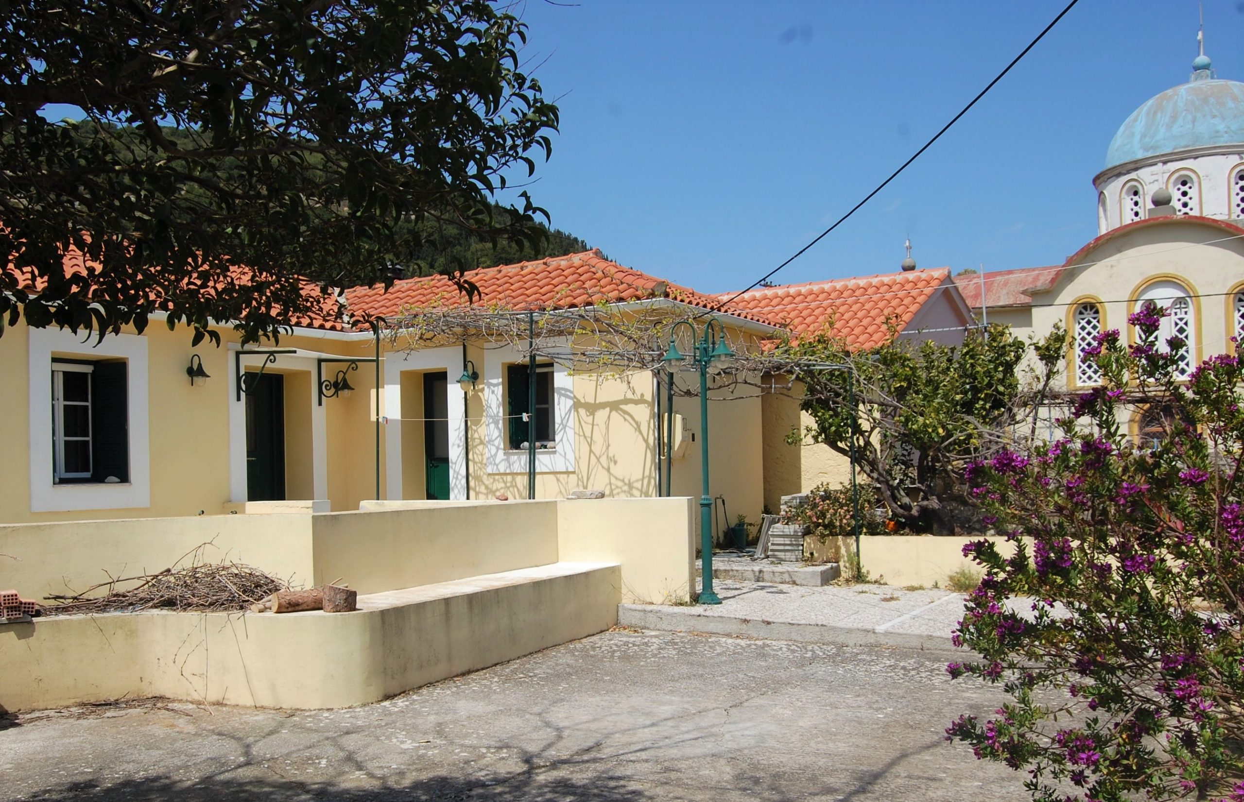 Exterior facade of house for sale in Ithaca Greece, Exoghi